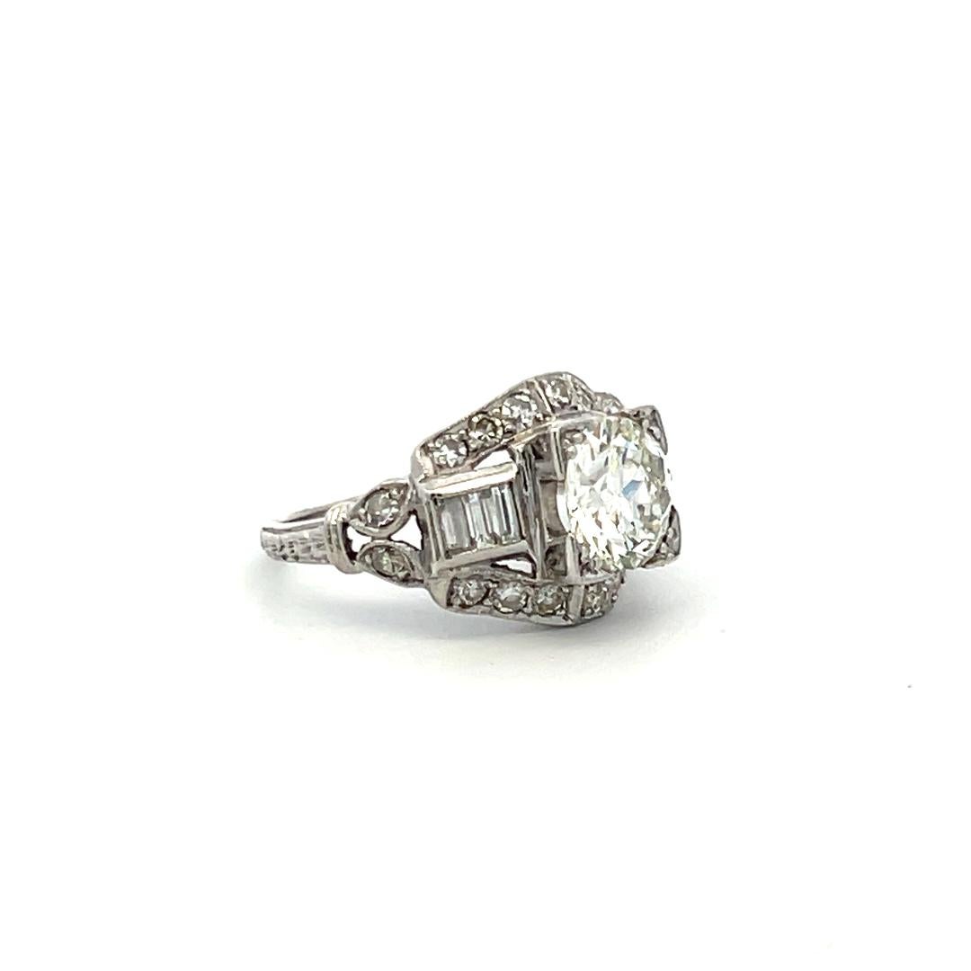 1.83 Carat Circular Brilliant and Baguette Shape Diamond Platinum Art-Deco Ring For Sale 1
