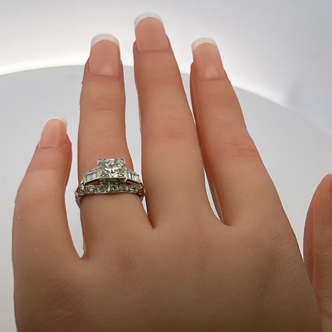 1.83 Carat Circular Brilliant and Baguette Shape Diamond Platinum Art-Deco Ring For Sale 3