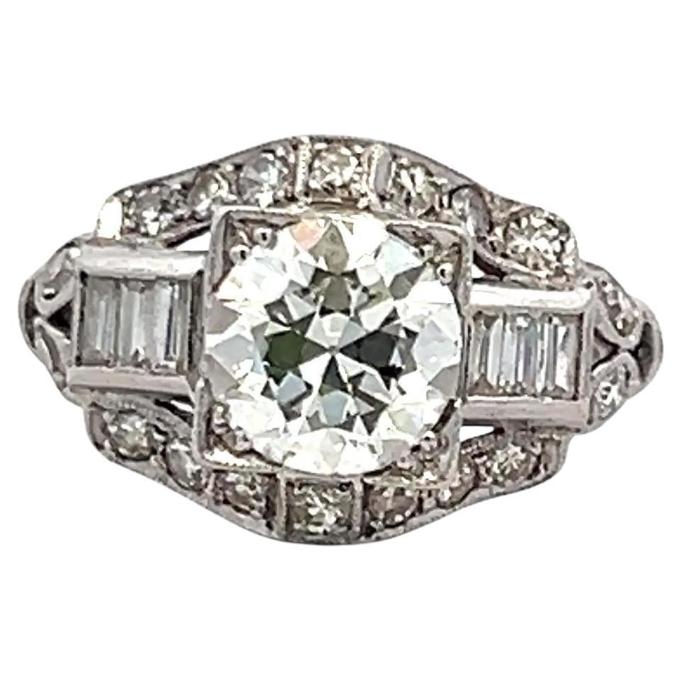 1.83 Carat Circular Brilliant and Baguette Shape Diamond Platinum Art-Deco Ring For Sale