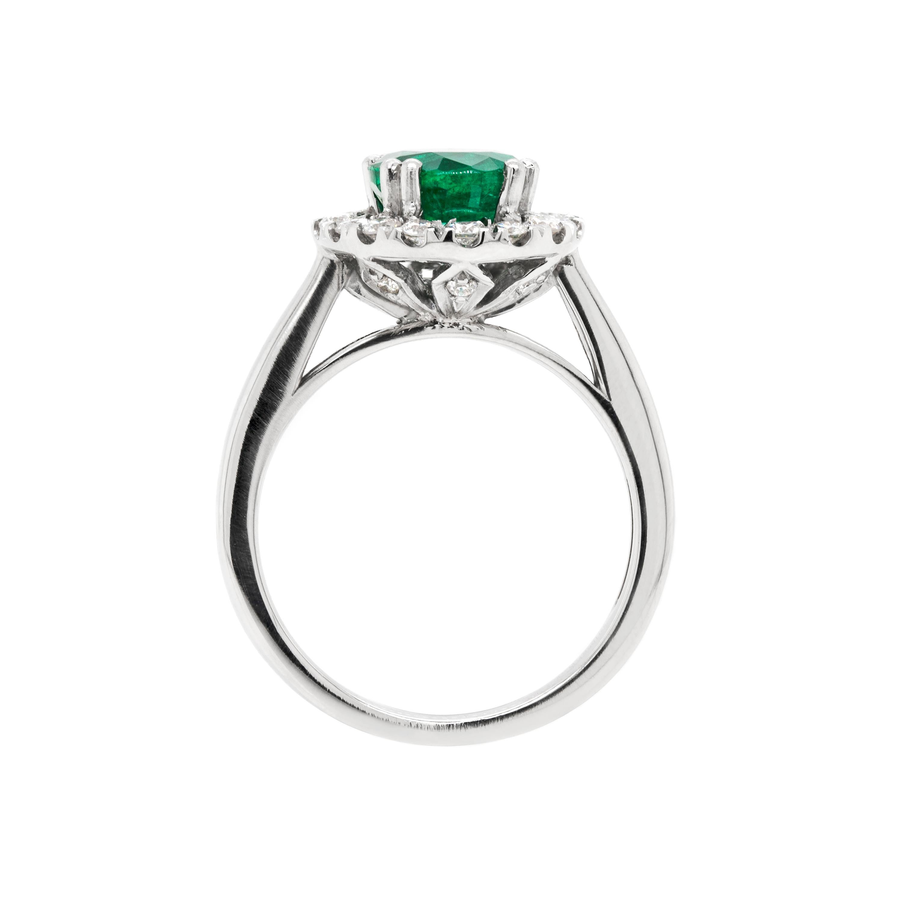1.83 Carat Emerald and Diamond Platinum Cluster Engagement Ring In New Condition For Sale In London, GB