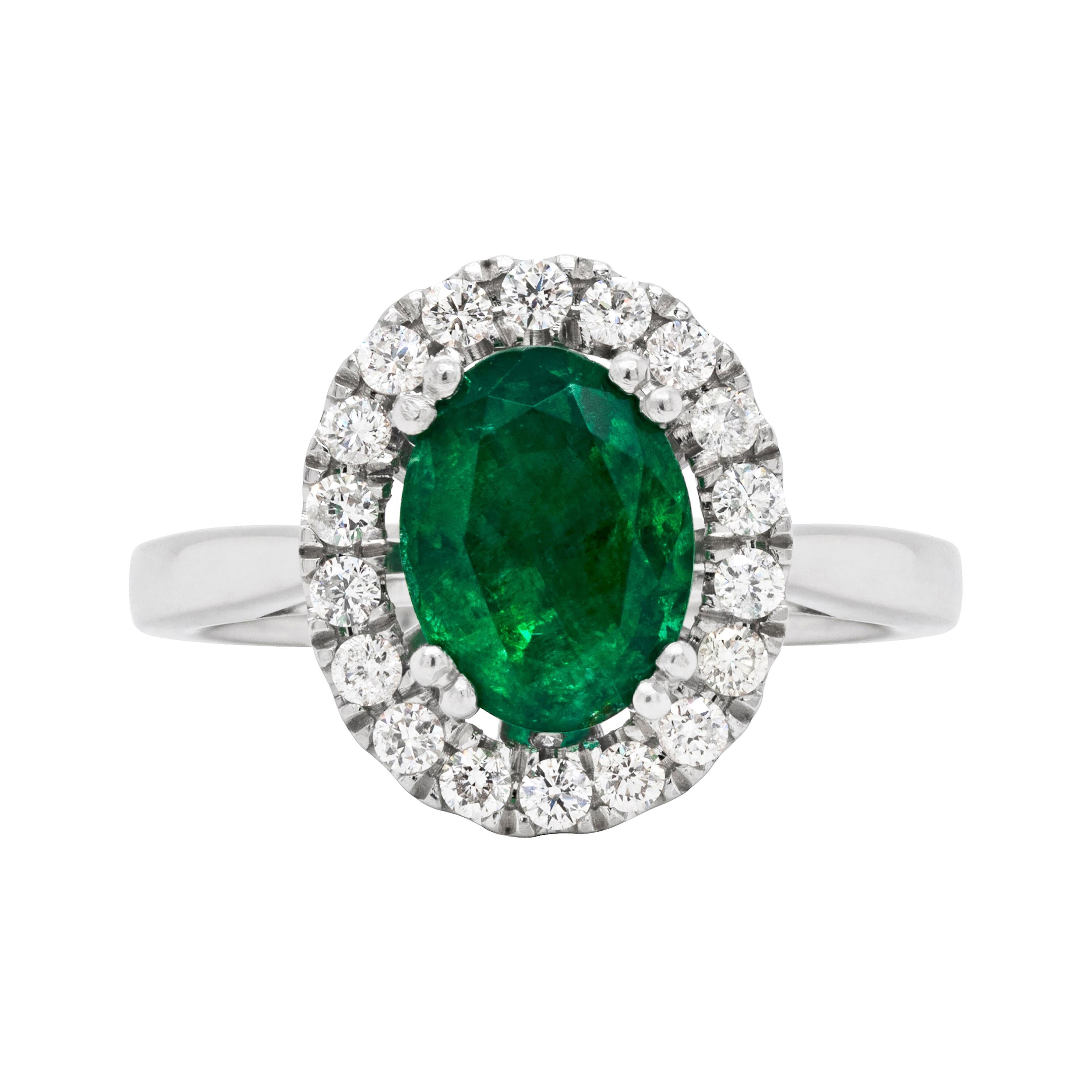 1.83 Carat Emerald and Diamond Platinum Cluster Engagement Ring For Sale