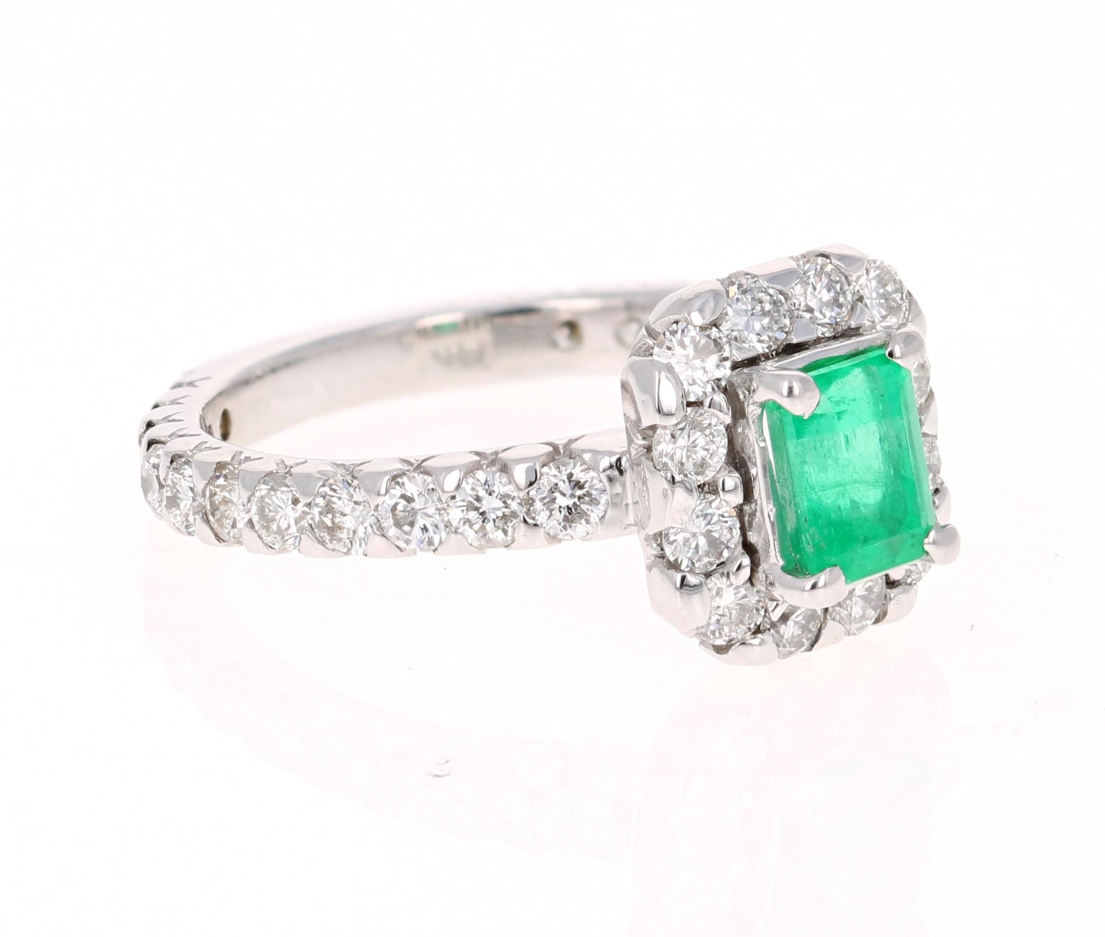 A beautiful & classic setting holding a Natural Emerald that weighs 0.78 carats. Surrounded by 24 Round Cut Diamonds that weigh 1.05 carats with a clarity & color of SI-F.  The total carat weight of the ring is 1.83 carats.

The Emerald Cut Emerald