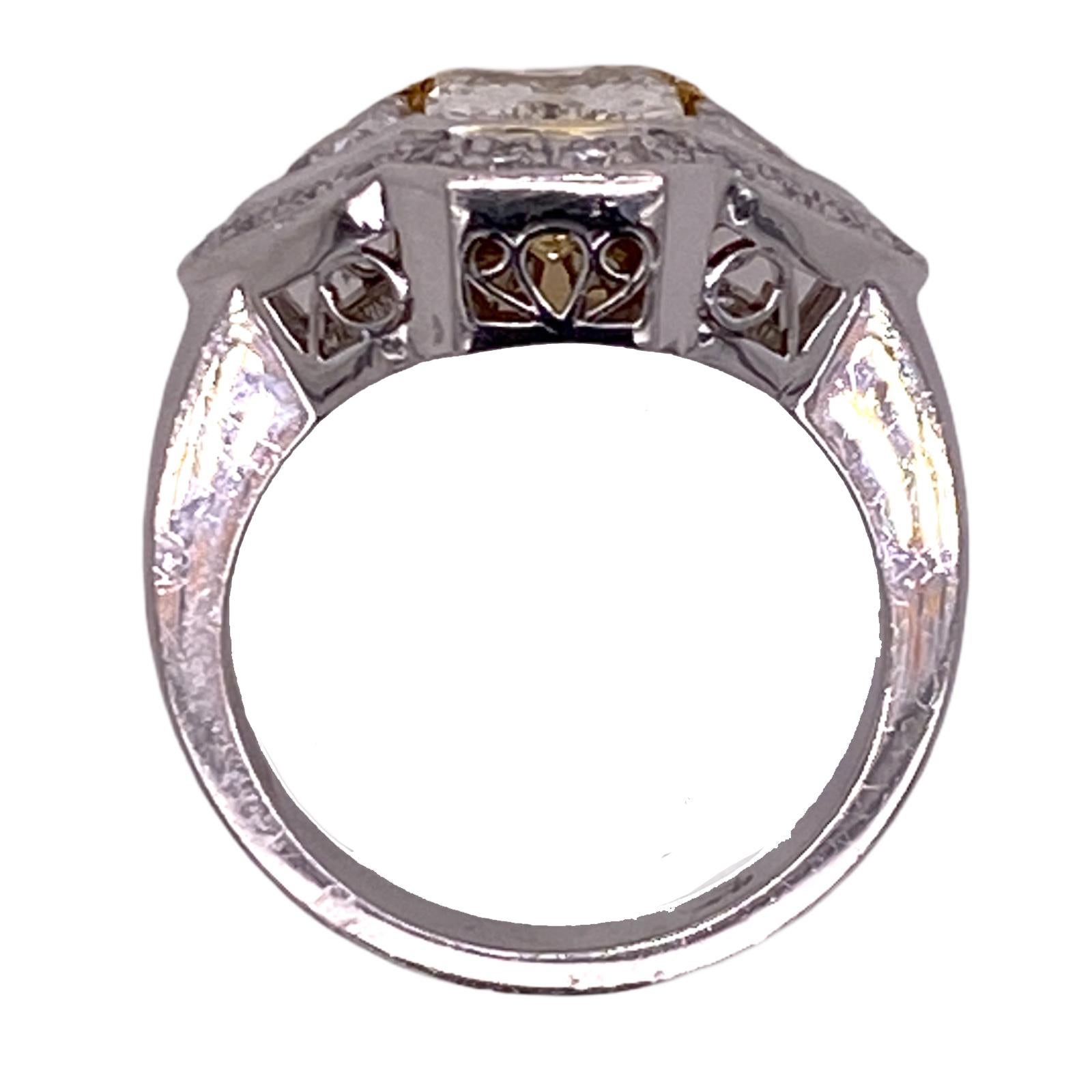 Modern 1.83 Carat Fancy Light Yellow Diamond Platinum Trillion Diamond Engagement Ring
