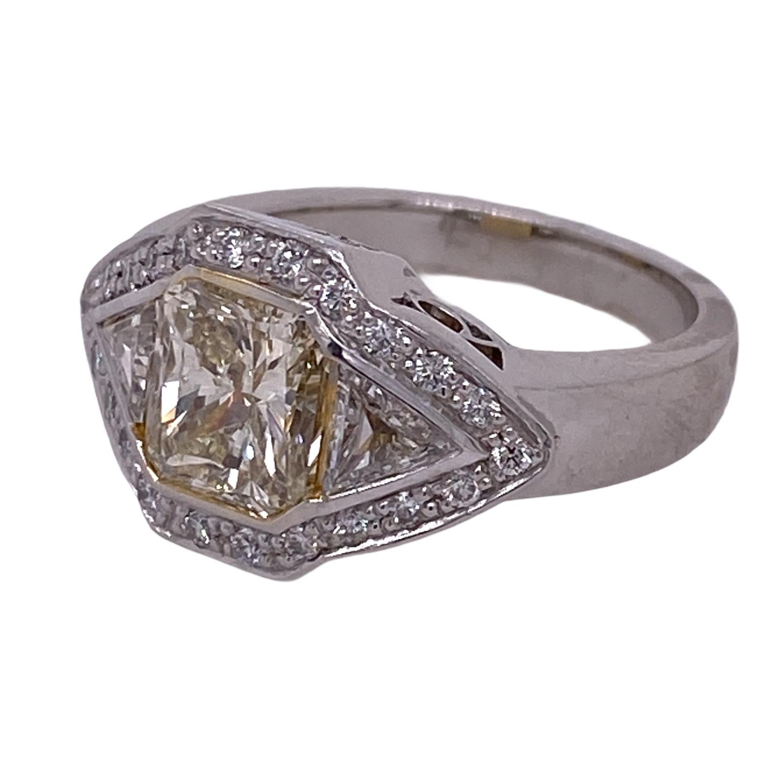 Emerald Cut 1.83 Carat Fancy Light Yellow Diamond Platinum Trillion Diamond Engagement Ring