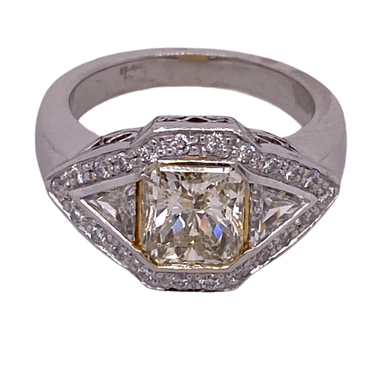 1.83 Carat Fancy Light Yellow Diamond Platinum Trillion Diamond Engagement Ring In Excellent Condition In Boca Raton, FL