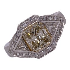 1.83 Carat Fancy Light Yellow Diamond Platinum Trillion Diamond Engagement Ring