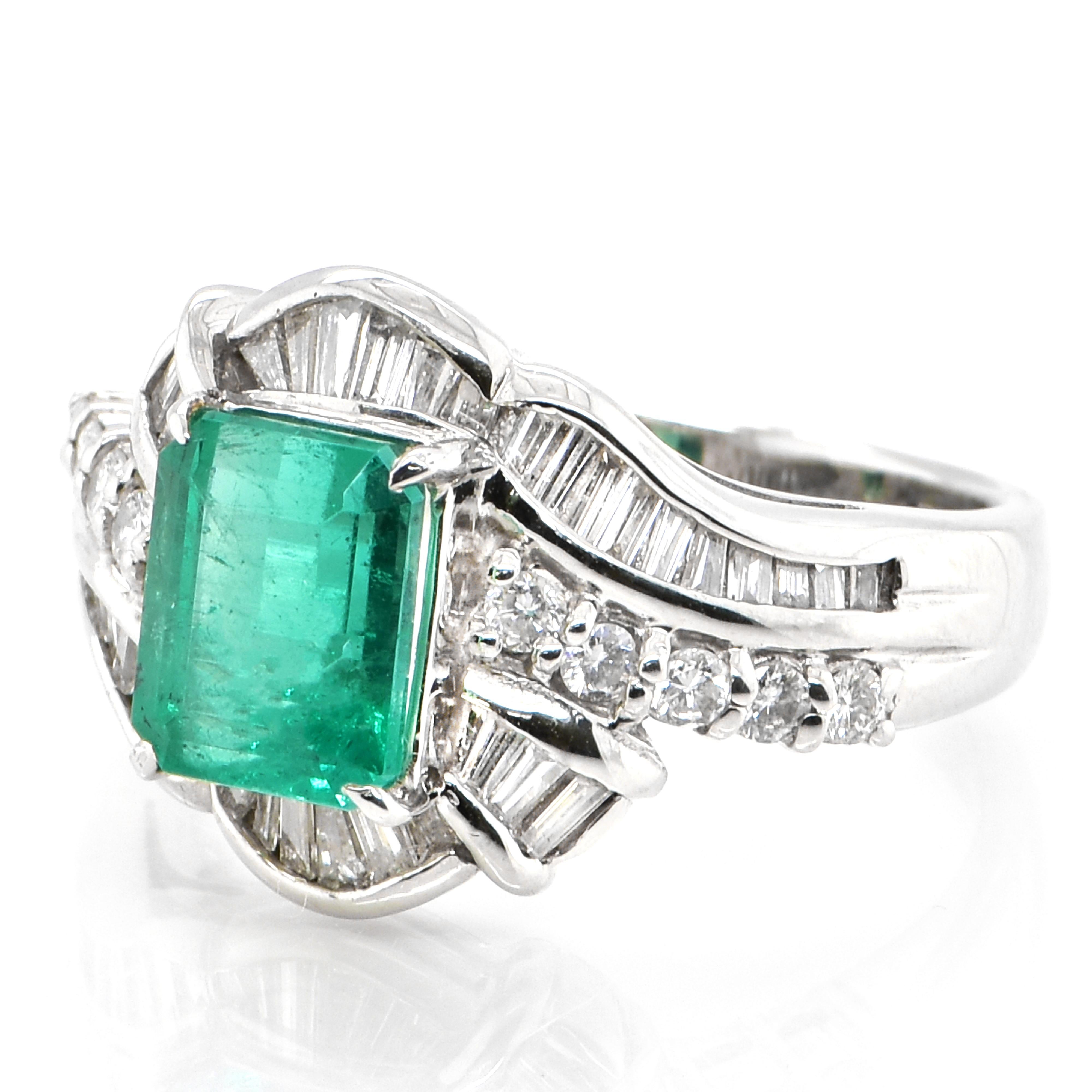 A stunning ring featuring a 1.83 Carat Natural Emerald and 0.69 Carats of Diamond Accents set in Platinum. People have admired emerald’s green for thousands of years. Emeralds have always been associated with the lushest landscapes and the richest