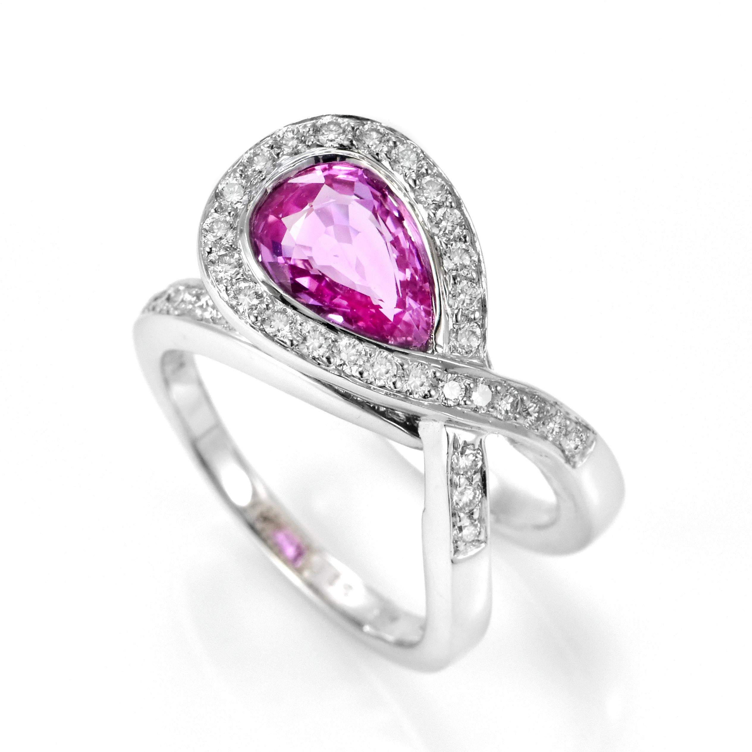 A beautiful Ring set in 18 Karat White Gold featuring a 1.83 Carat Natural Pink Sapphire and 0.65 Carat Diamonds. Sapphires have extraordinary durability - they excel in hardness as well as toughness and durability making them very popular in