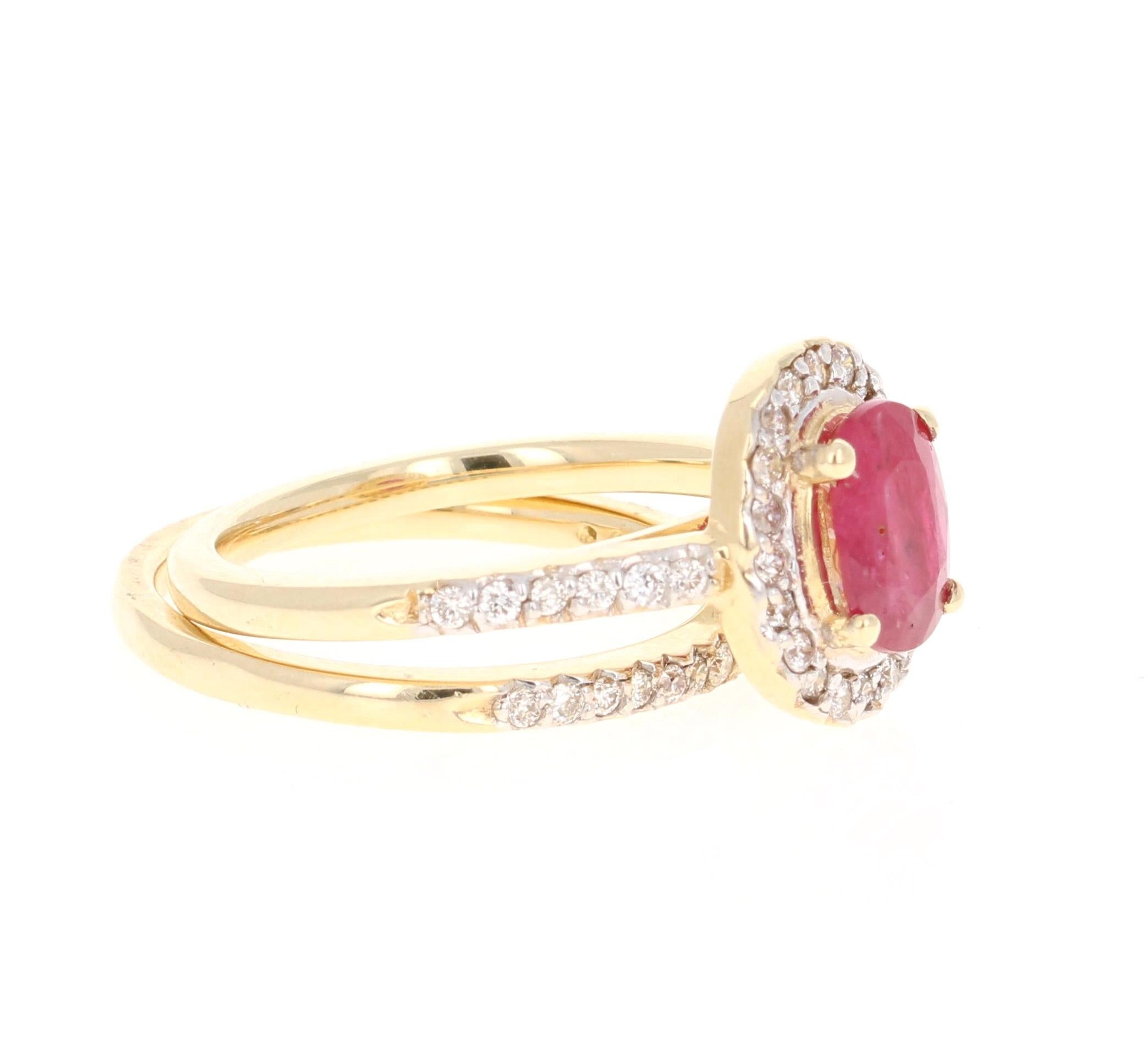 Simply beautiful Ruby Diamond Ring with a Oval Cut 1.33 Carat Ruby which is surrounded by 53 Round Cut Diamonds that weigh 0.50 carats. The total carat weight of the ring is 1.83 carats. 

The ring is casted in 14K Yellow Gold and weighs