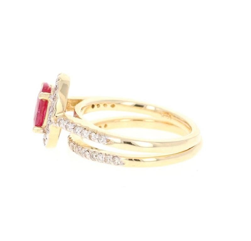 Modern 1.83 Carat Oval Cut Ruby Diamond 14 Karat Yellow Gold Engagement Ring and Band For Sale