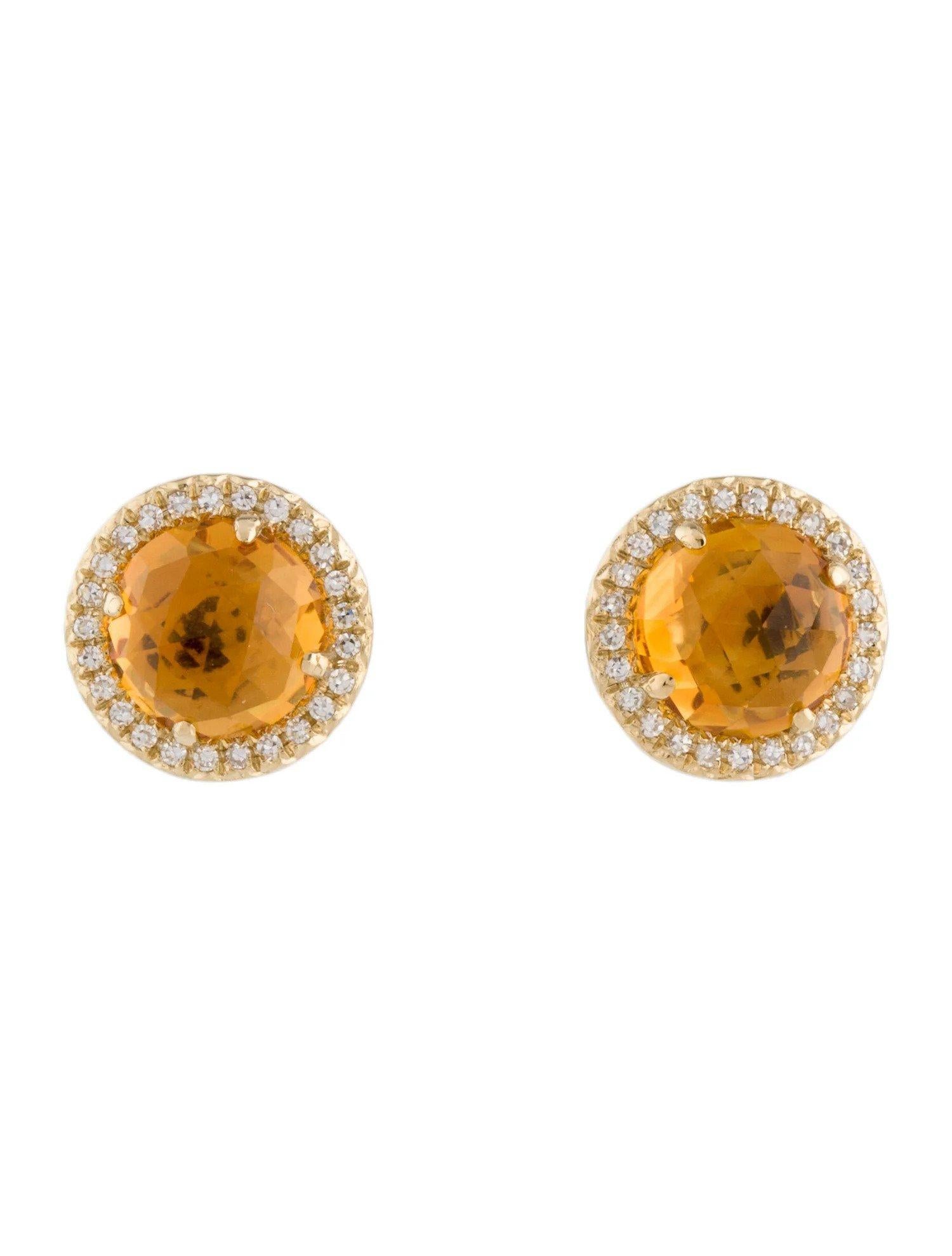 These Citrine & Diamond Earrings are a stunning and timeless accessory that can add a touch of glamour and sophistication to any outfit. 

These earrings each feature a 0.90 Carat Round Citrine, with a Diamond Halo comprised of 0.06 Carats of Single