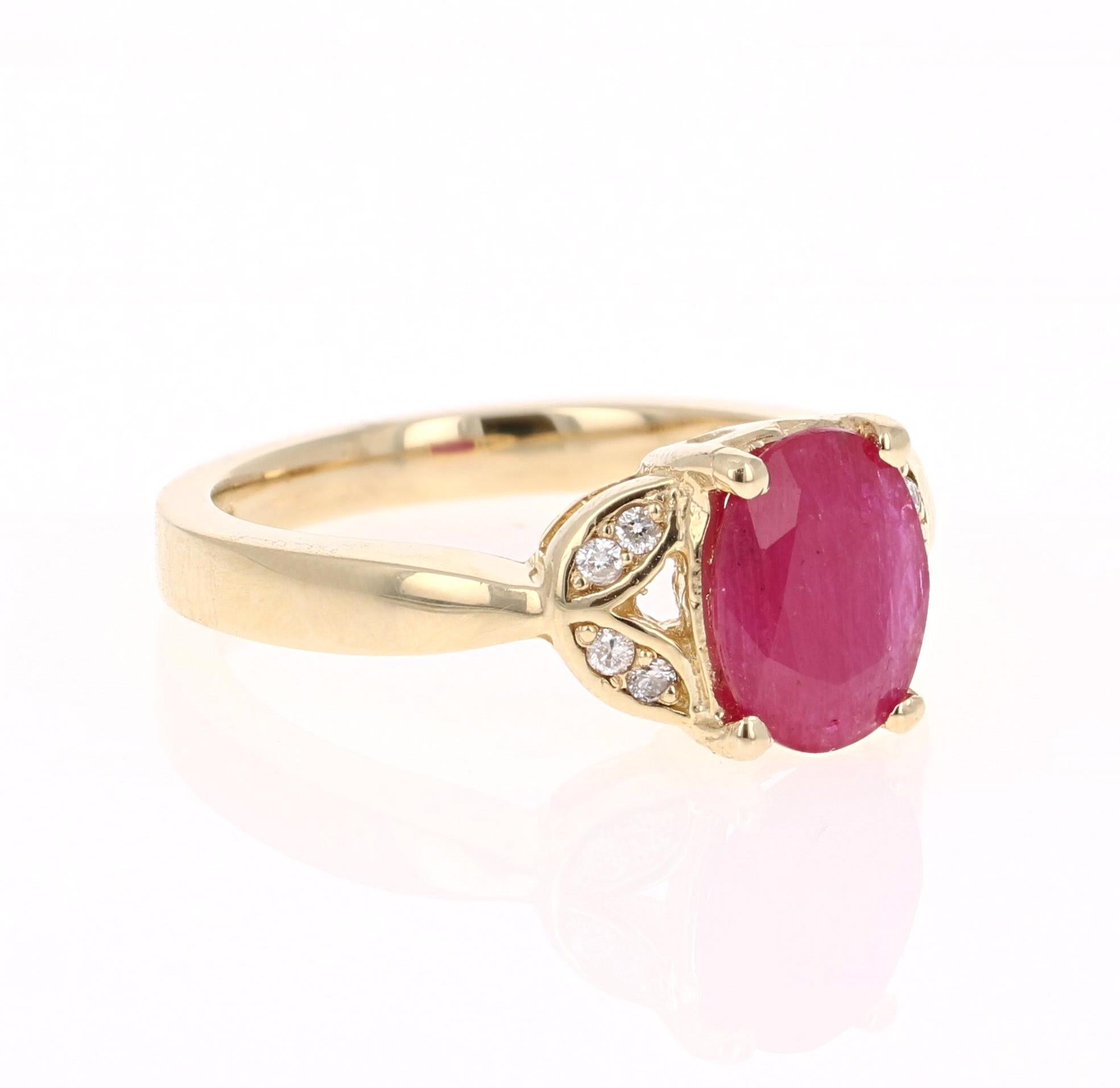 Simply beautiful Ruby Diamond Ring with a Oval Cut 1.75 Carat Ruby which is surrounded by 8 Round Cut Diamonds that weigh 0.08 carats. The total carat weight of the ring is 1.83 carats. 

The ring is curated in 14K Yellow Gold and weighs