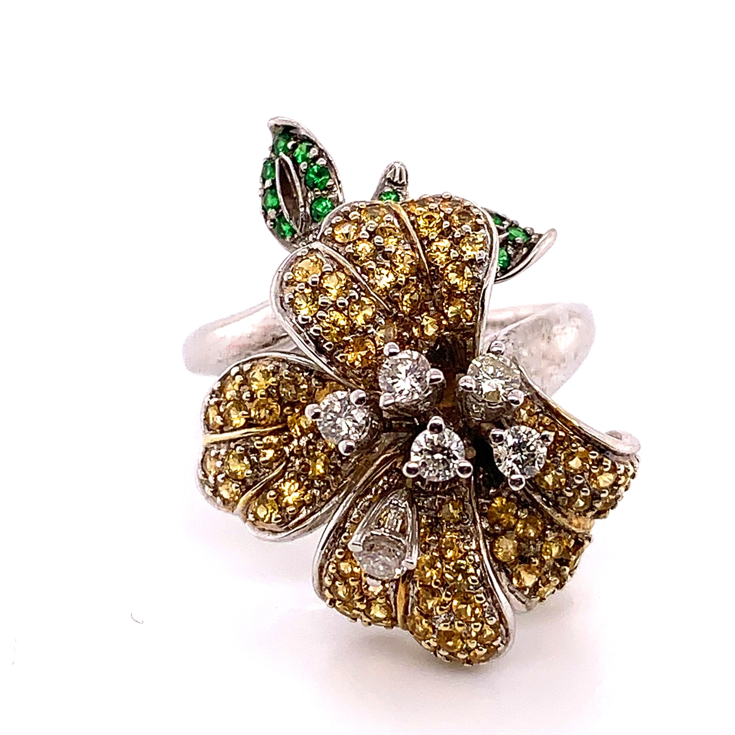 The joy derived from this beautiful ring from nature will simply delight you as you wear it. 
Our one of a kind ring made by Shimon's Creations features 1.83 Carats of Yellow Sapphire, Green Tsavorite and Diamond stones. The yellow sapphire and