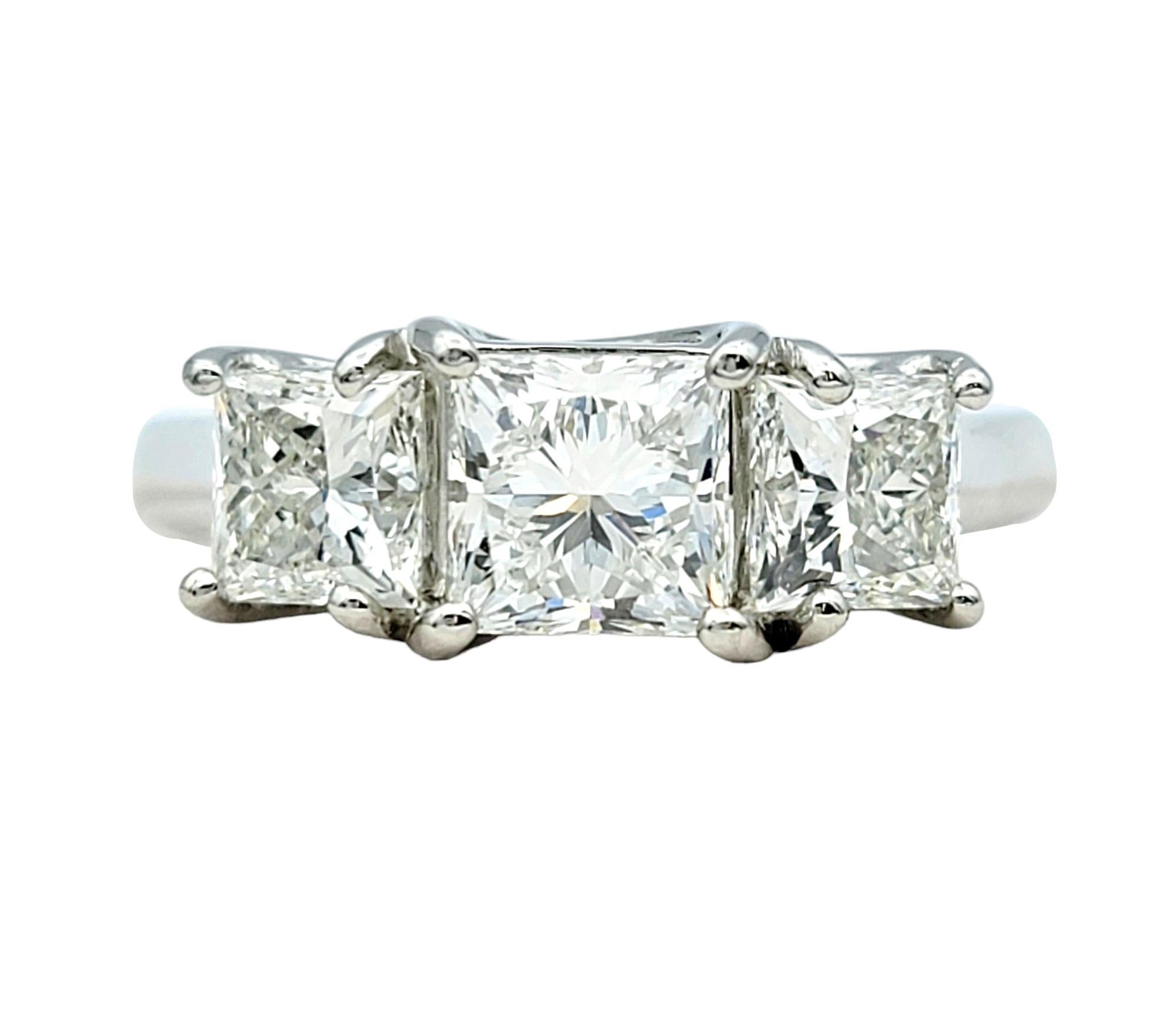 Contemporary 1.83 Total Carat Princess Cut Three Stone Diamond Ring Set in Platinum, Size 5.5 For Sale