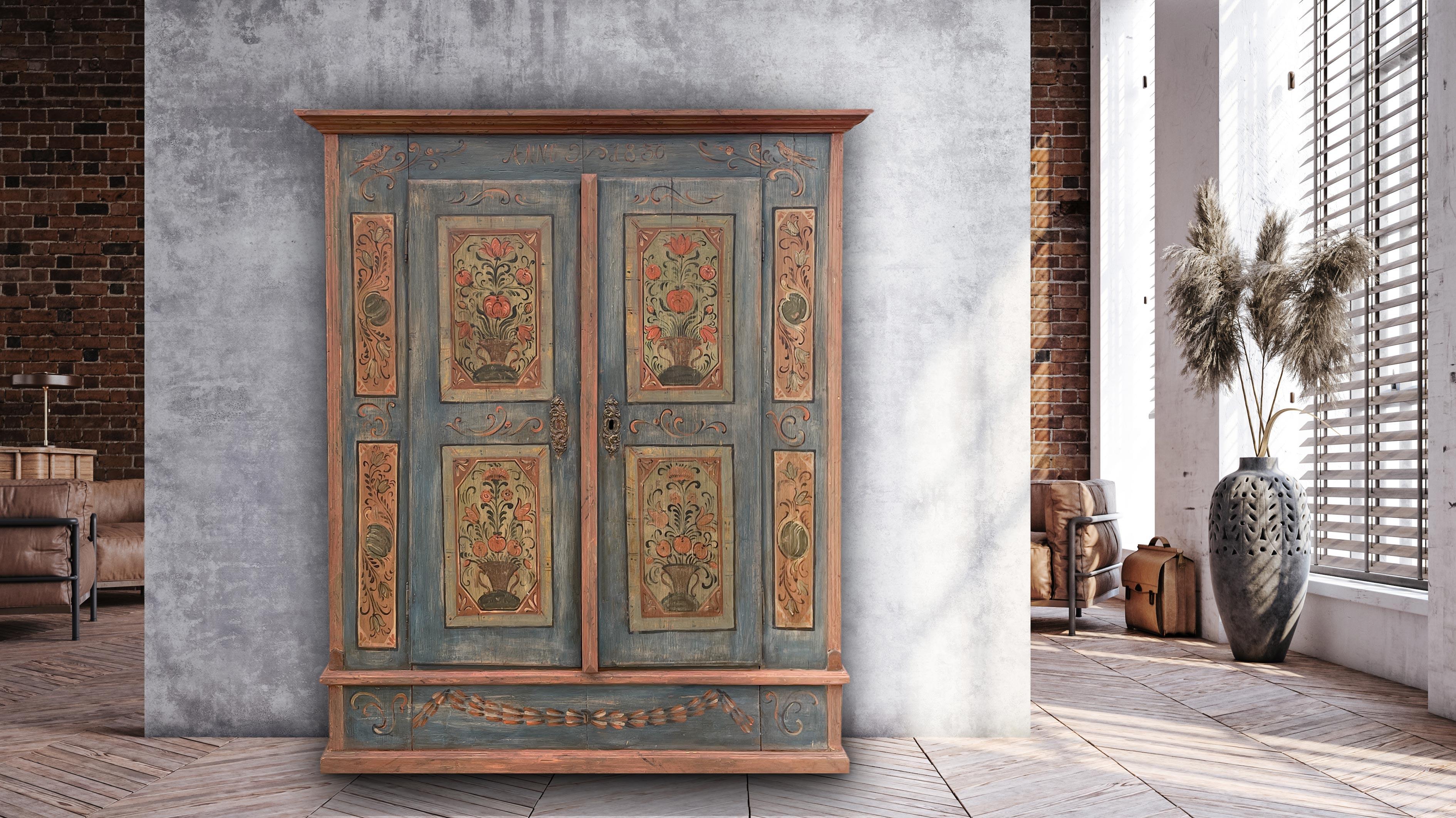 Antique Tyrolean Blue wardrobe dated 1830

Measurements: H. 173 cm – L. 136 cm (148 cm at the frames)  – P. 40 cm (46 cm at the frames)
Essence: Fir
Period: 1830
Origin: Tyrol (Northern Italy alpine region)

Tyrolean wardrobe, with two doors,