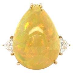 Auktion - 18.30 Karat Opal und 1,11 Karat Diamantring