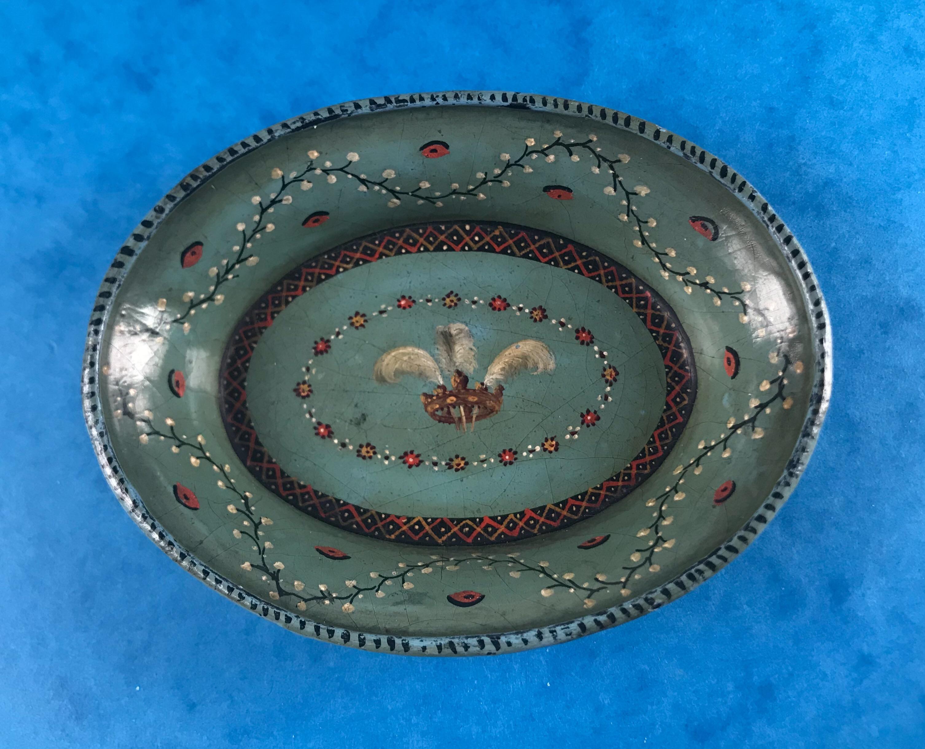 A beautiful little Georgian 1830 hand painted green papier-mâché pin or counter tray, it’s inlaid with red flowers and white feathers. It measures: 11 by 8.5 and stands 3 cm high.