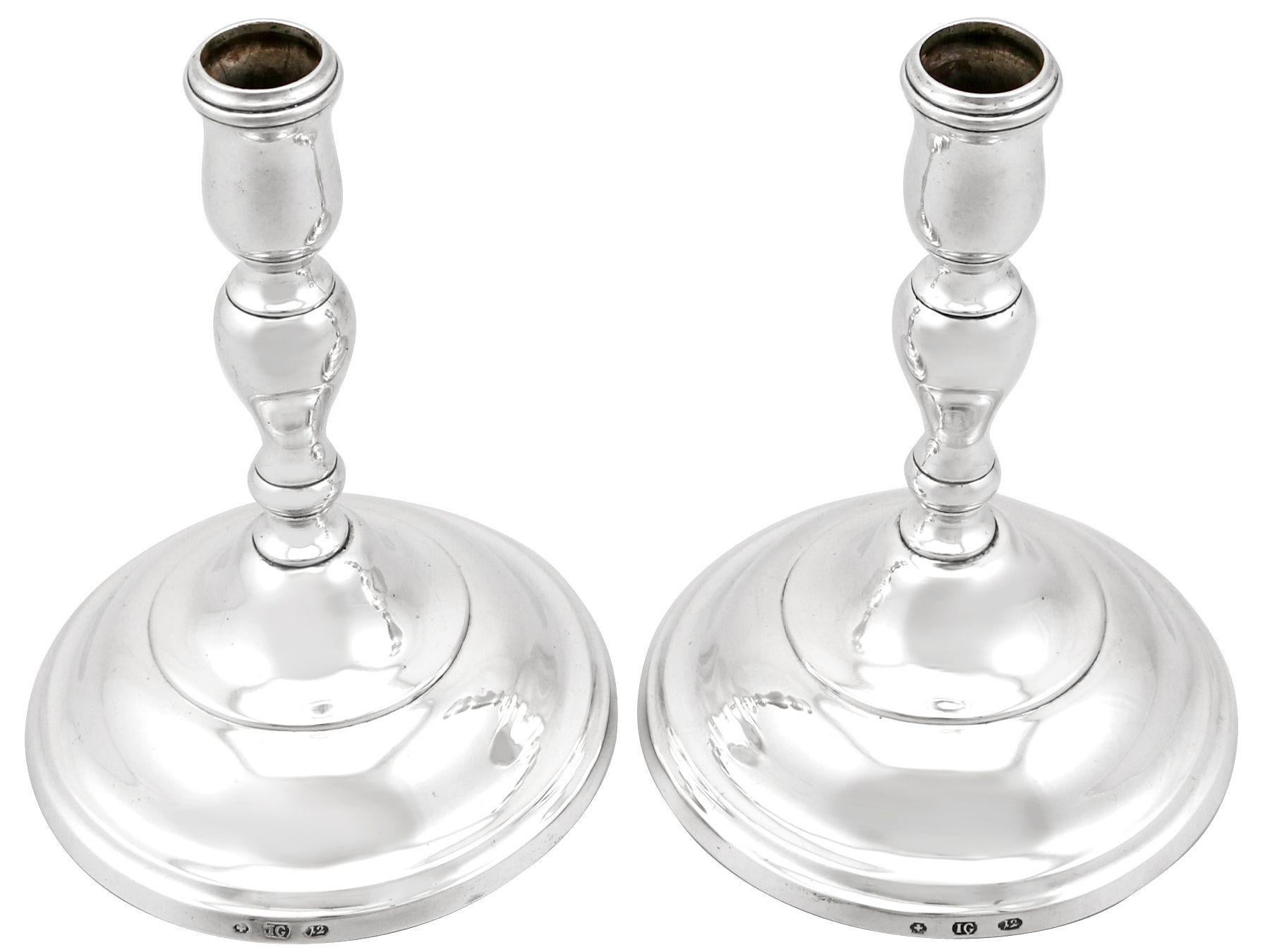 An exceptional, fine and impressive pair of antique Baltic silver candlesticks; an addition to our ornamental silverware collection

These exceptional antique silver candlesticks have a baluster, circular rounded form.

The Baltic* candlesticks have