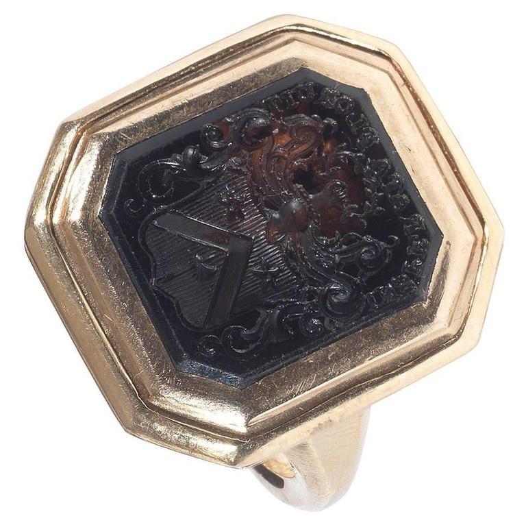 

A rectangular smokey quartz with intaglio engraved crest and motto ‘Insperata Flourit’ setting in 18kt yellow gold

Size : 8

Weight : 23.4 gr

Coat of Arms : George Watson (1768-1837) was born in Berwickshire, and became a distinguished portrait