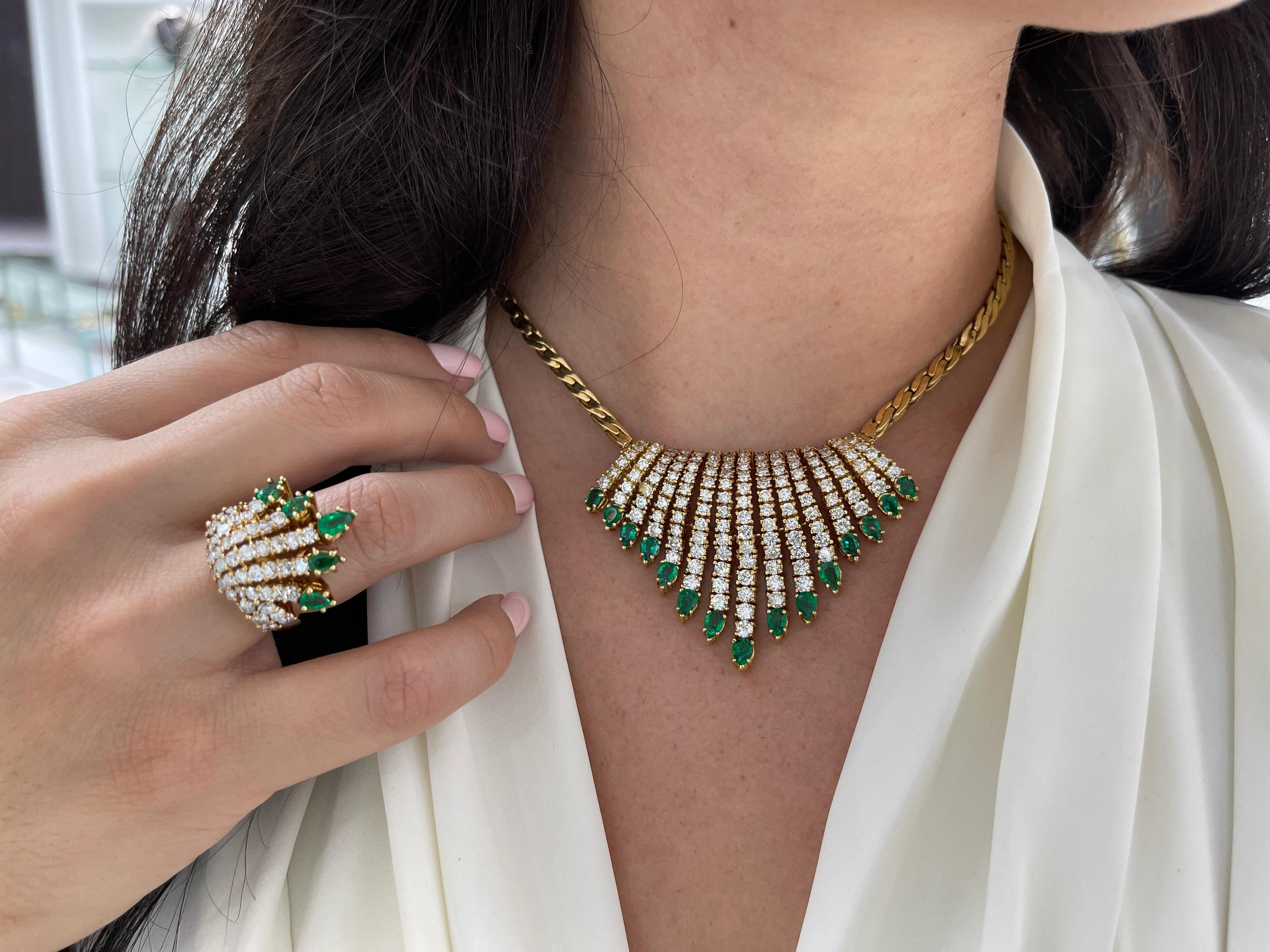 An exquisite Colombian emerald & diamond jewelry set. This necklace showcases 15 Muzo green, pear-shaped, emeralds. Each emerald is hand selected and perfectly matched. One hundred fifty-four, expertly selected brilliant round diamonds fan the