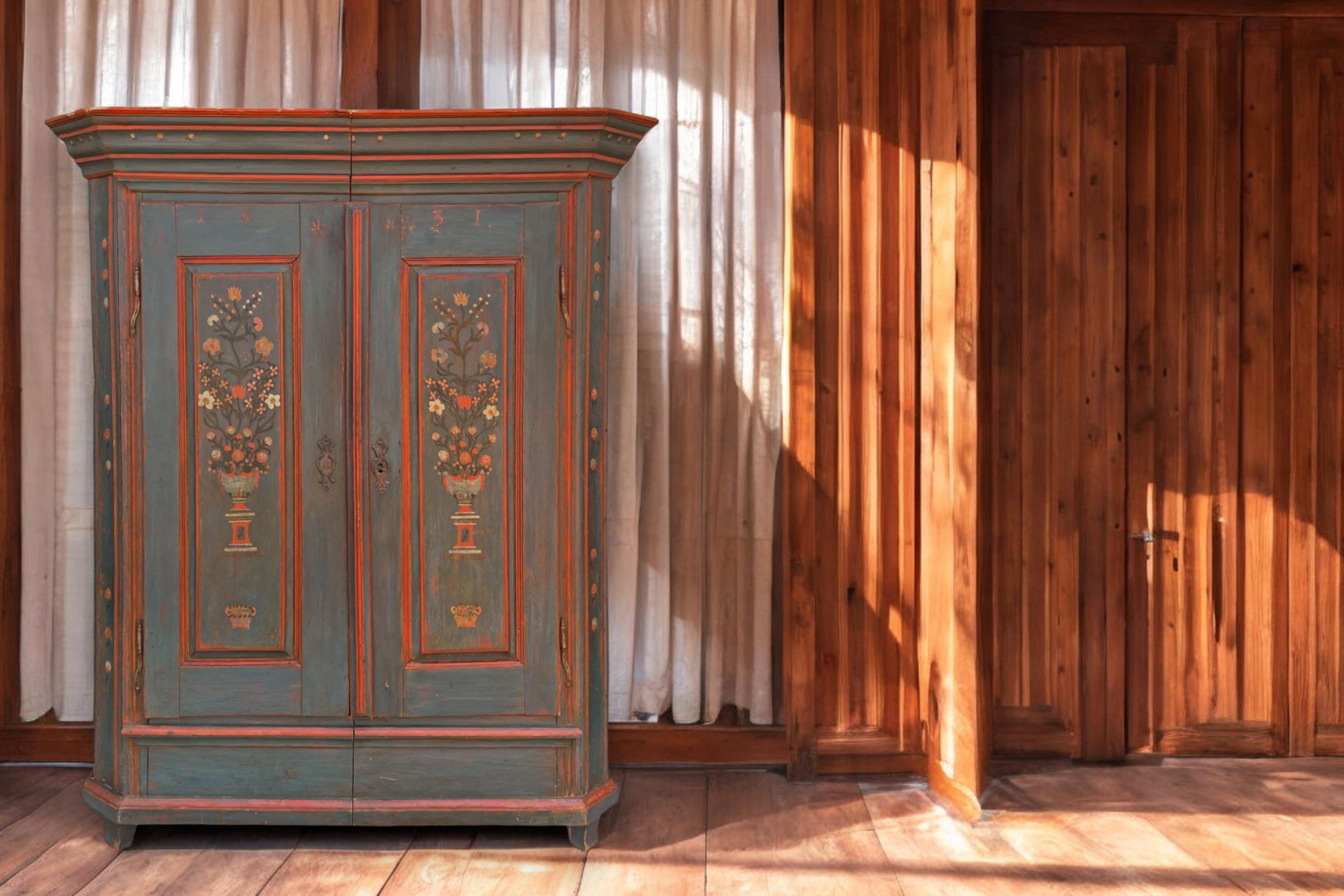 Blue Floral Painted Wardrobe Dated 1831

Measurements: H. 190 cm – W. 135 (155 to the frames) cm – D. 50 (60 to the frames) cm
Period: 1831
Origin: Tyrol
Wood: Fir

Description:
Tyrolean painted wardrobe with two doors, entirely painted in an