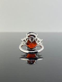 18.32 Carat Spessartine Mandarin Garnet and Diamond Three Stone Ring