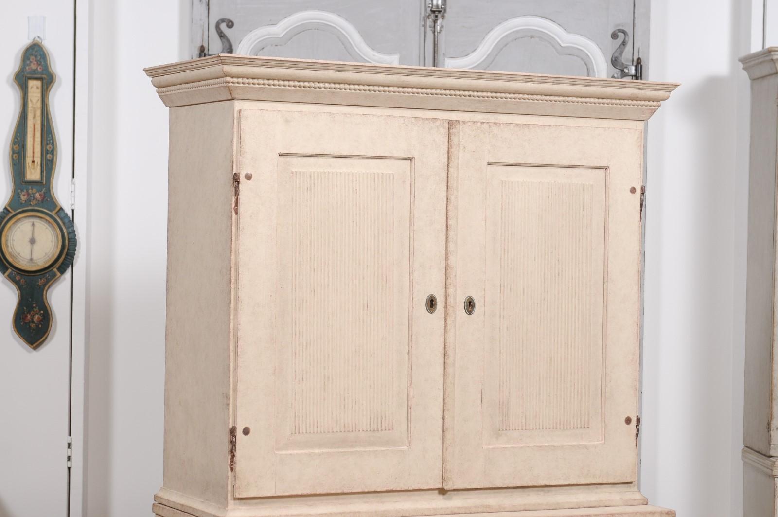 Carved 1834 Swedish Two-part Painted Cabinet with Doors and Graduated Drawers For Sale