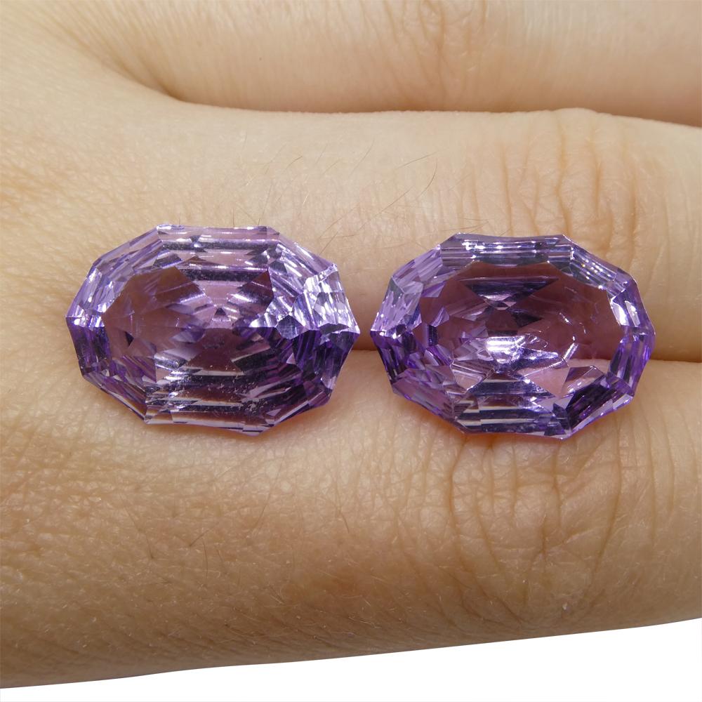 Description:

Gem Type: Amethyst
Number of Stones: 2
Weight: 18.35 cts
Measurements: 17.4x12.4x9.40 mm
Shape: Oval
Cutting Style: Fantasy Cut
Cutting Style Crown: Modified Brilliant
Cutting Style Pavilion: Mixed Cut
Transparency: