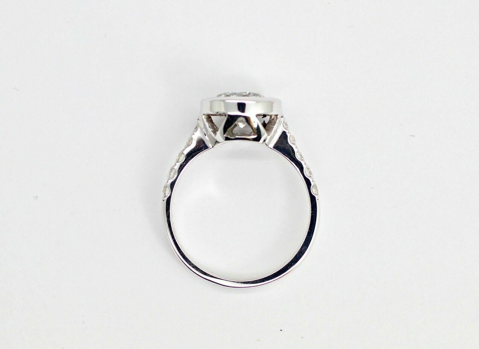 Round Cut 1.83 Carat Diamond Bezel Ring with 1.54cts. center diamond