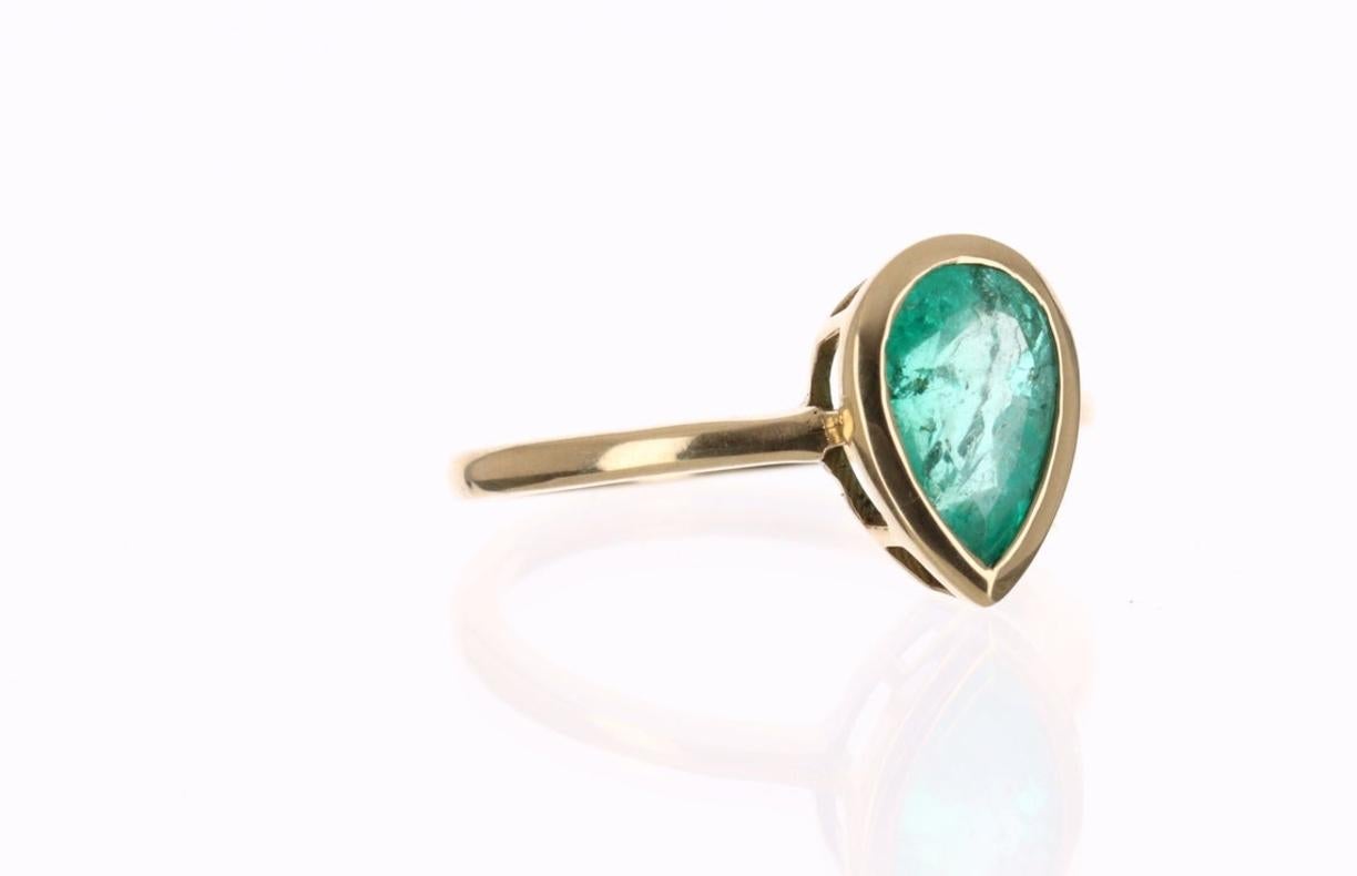 Modern 1.83tcw 14K Colombian Emerald Pear Cut Bezel Solitaire Ring For Sale