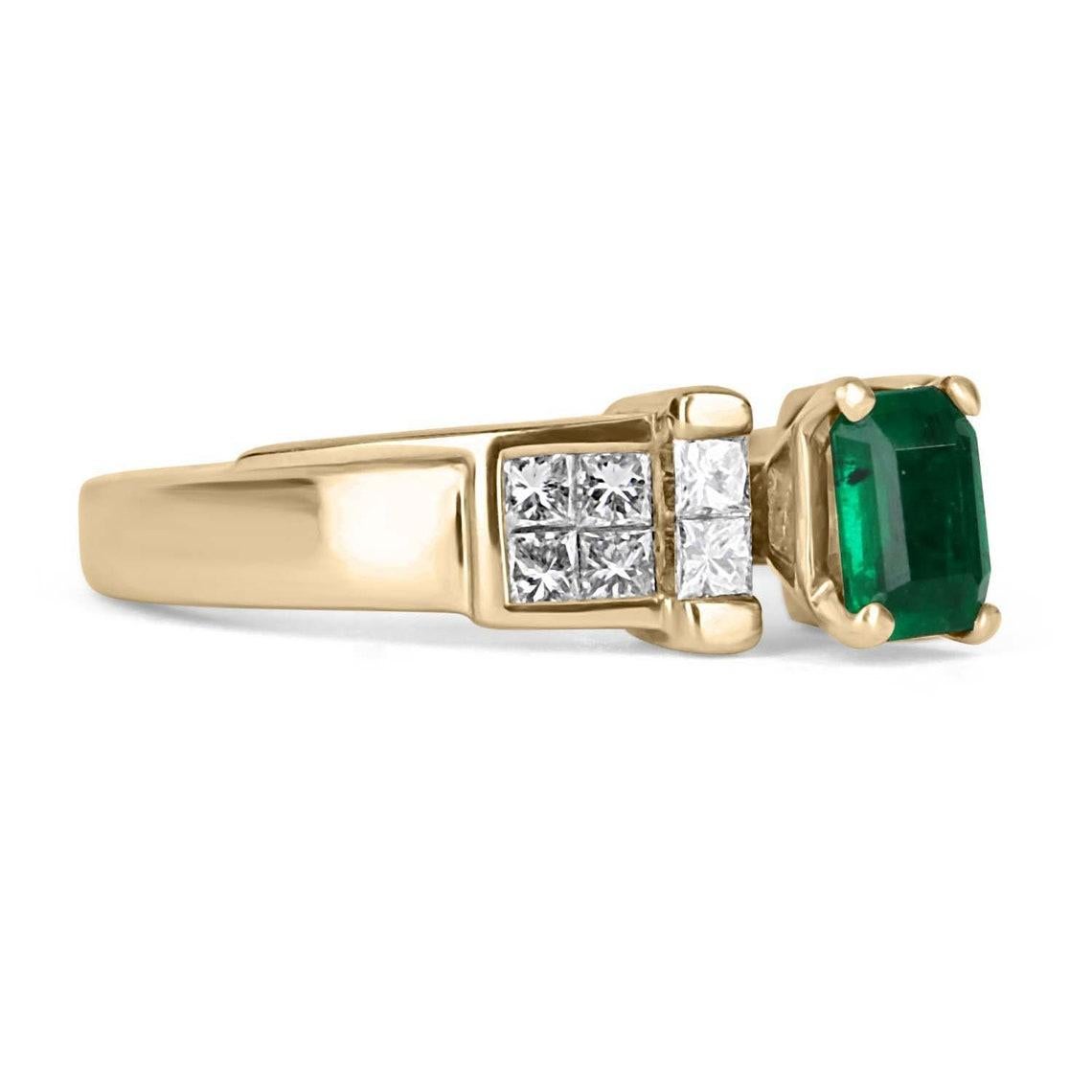 Displayed is a spectacular AAA Emerald Cut Colombian emerald and diamond princess cut ring. Skillfully set in 18k yellow gold, the sublime emerald weigh a perfect 0.63 carats and is set alongside H color (near colorless), VS-SI clarity princess cut
