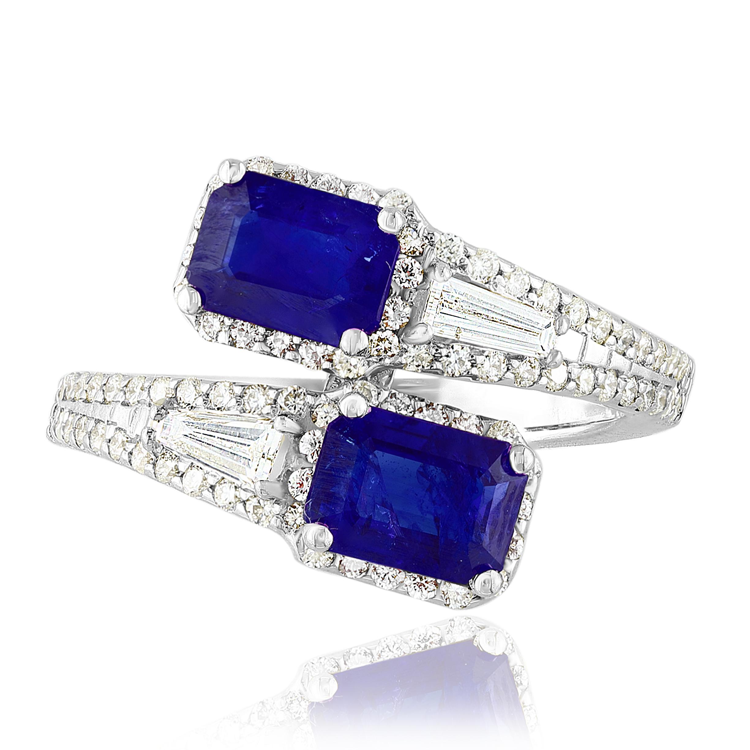 The stunning forever-together Toi et Moi ring features 2 Emerald cut Sapphires embraced by east to west 2 baguette diamonds weigh and 84 round diamonds halfway to the shank. Handcrafted in 14k White Gold.
2 emerald cut Sapphires in the center weigh