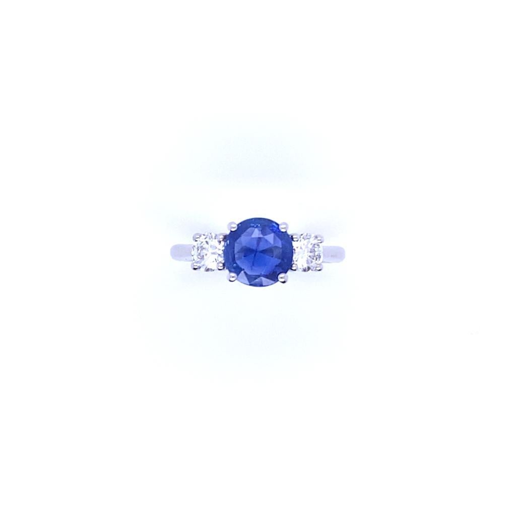 Round Cut 1.84 Carat Kashmir Sapphire and Diamond Three Stone Platinum Engagement Ring For Sale