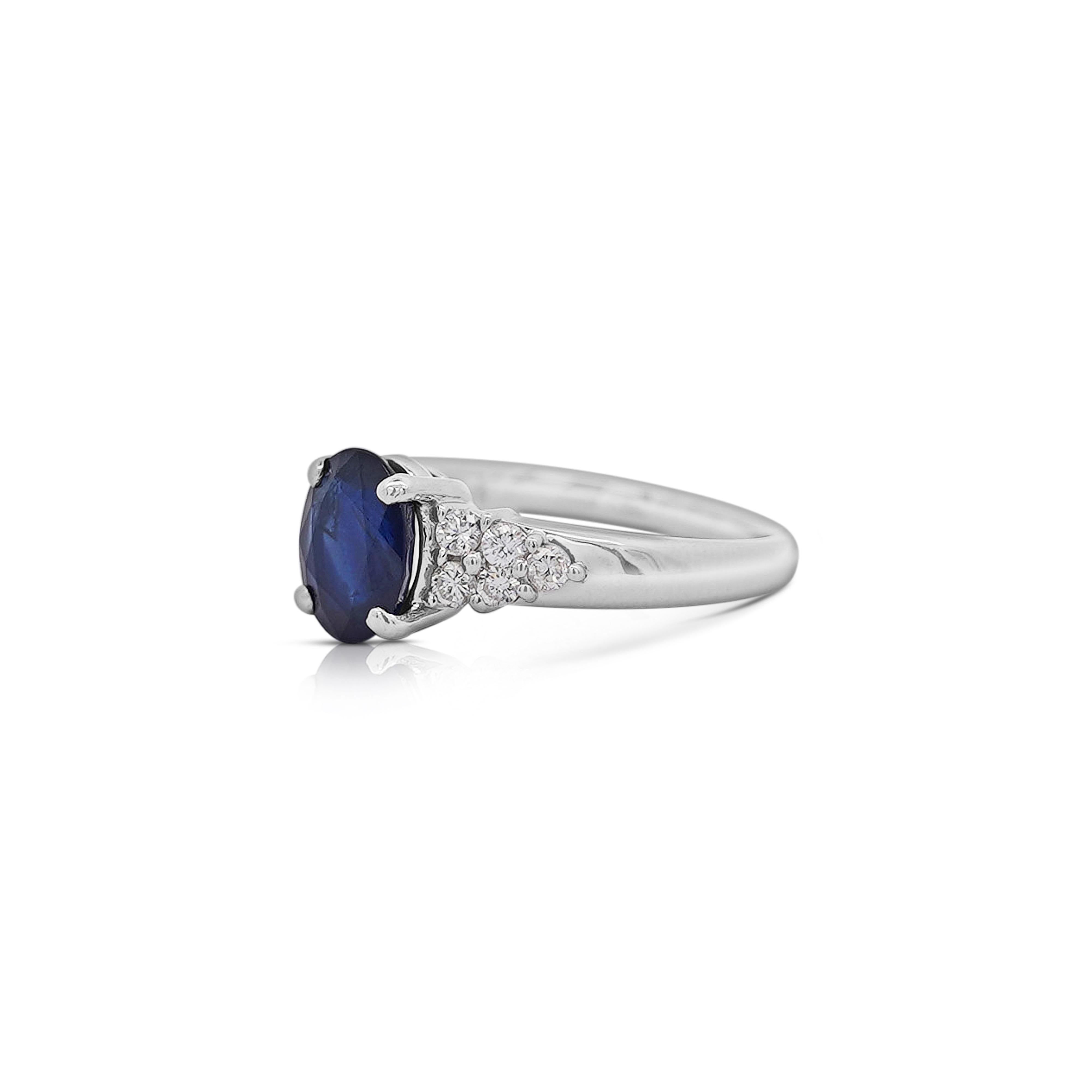 1.84 Carat Oval Cut Dark Blue Sapphire and Diamond Ring For Sale 1