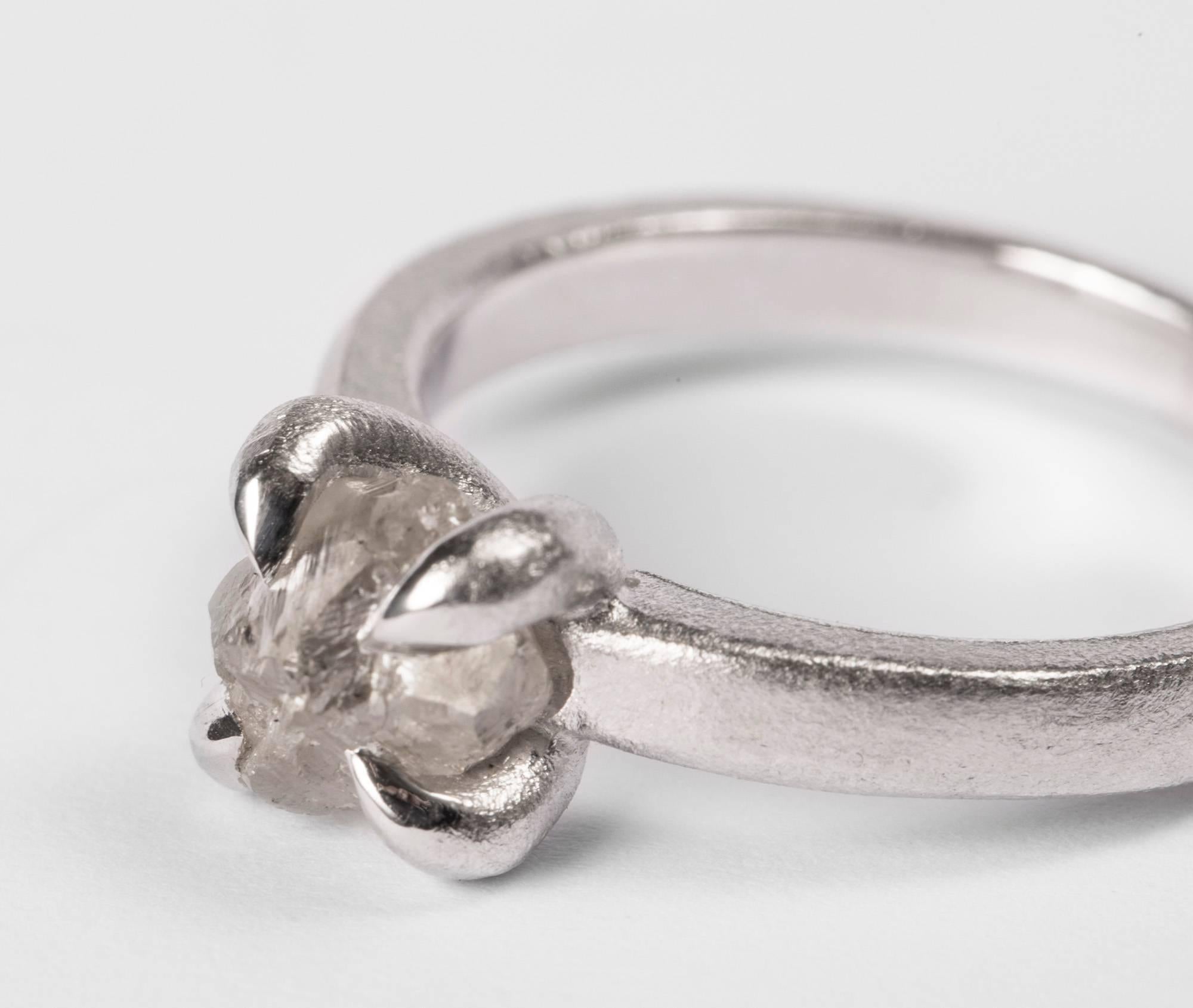 1.84 ct. Natural Whitish Rough Diamond in 14K handcrafted white gold ring.

Origin of Diamond: Williamson Mine, Tanzania

Every rough diamond from Roughdiamonds dk has been personally handpicked by Maya Bjørnsten. The diamonds we reject are sent