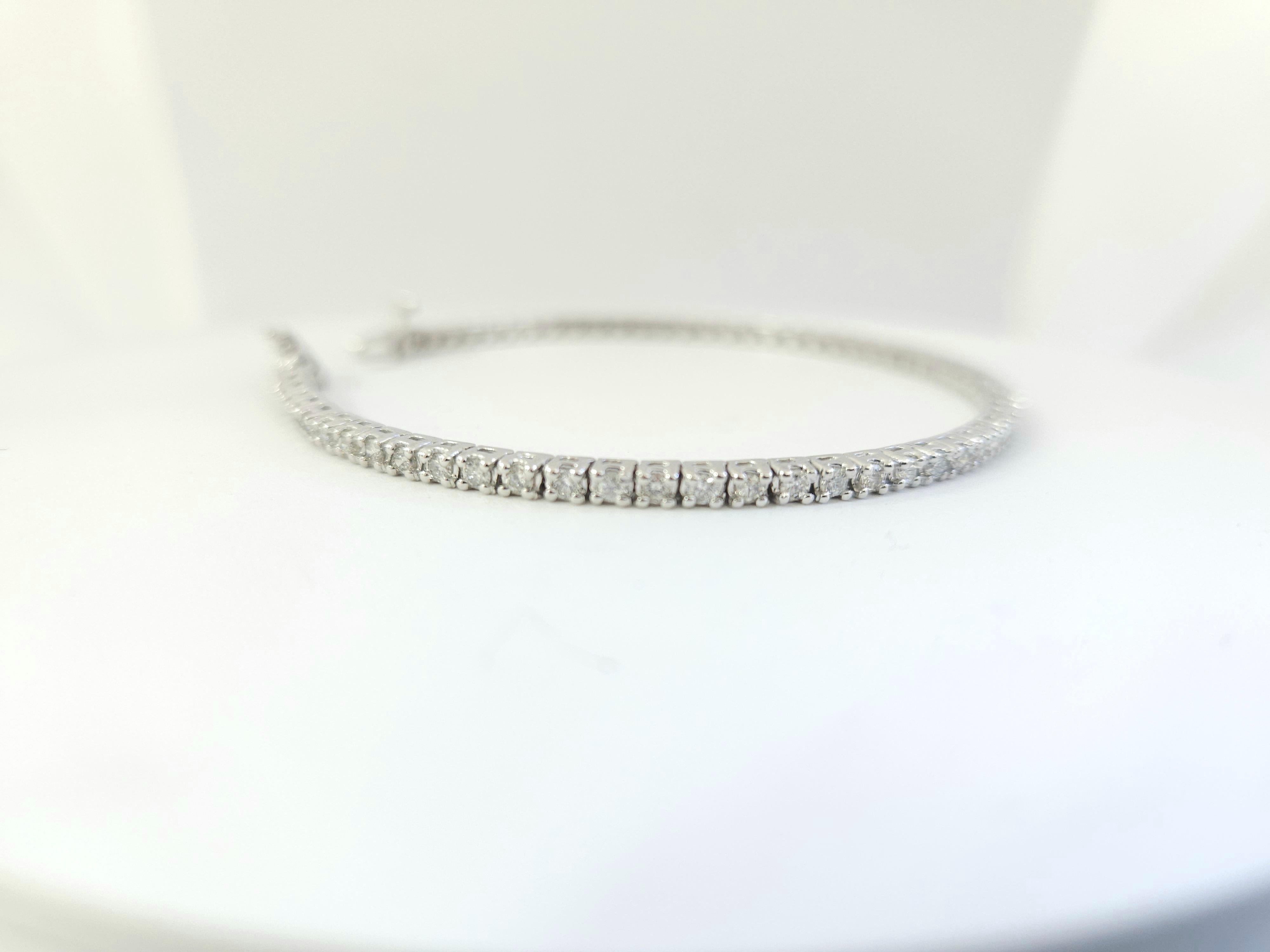 Natural diamonds tennis bracelet round-brilliant cut  14k white gold. 
7 inch. Average Color F, Clarity I 2.40 mm wide,66 pcs, 8.24 grams very shiny don't miss.

*Free shipping within U.S*

