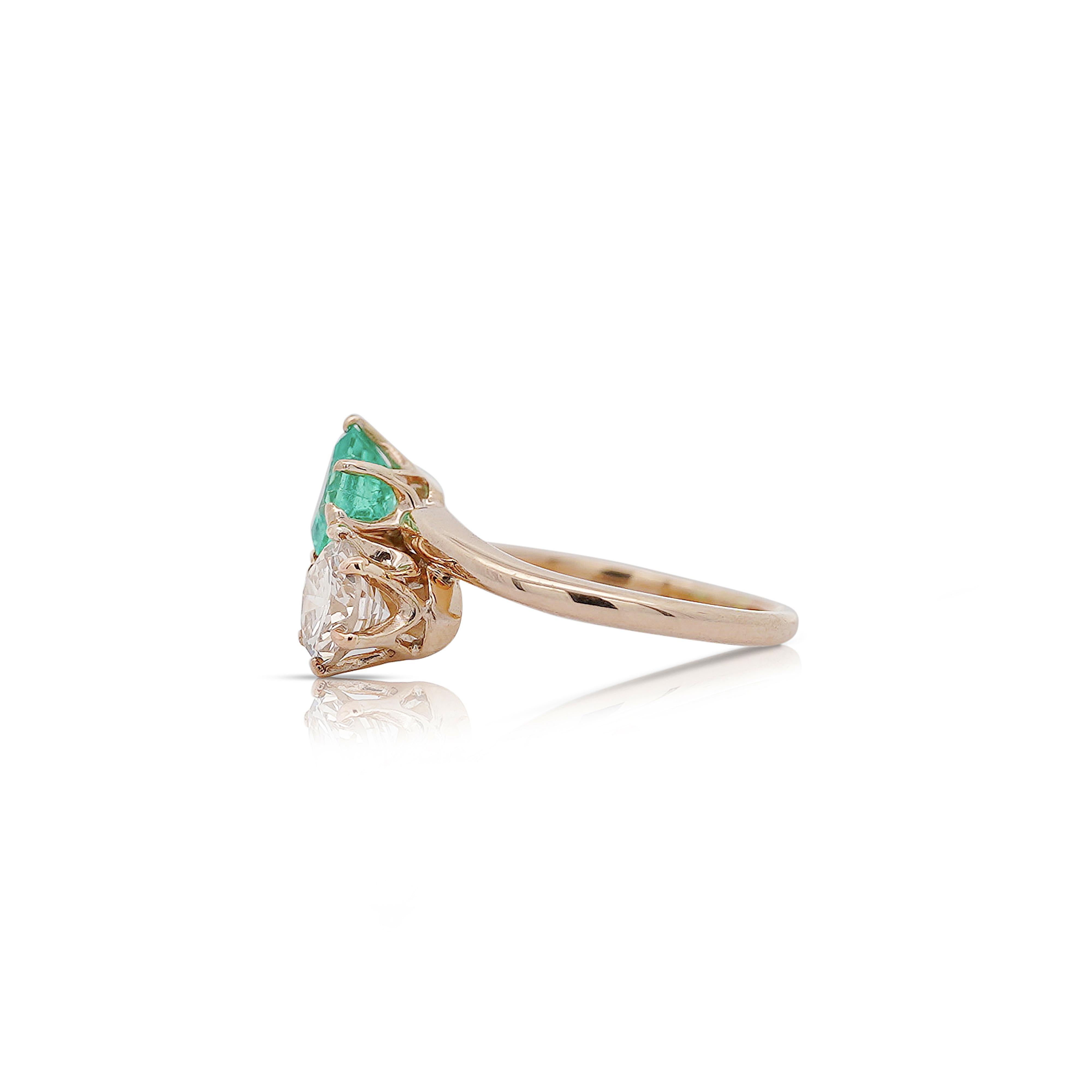1.84 Carat Emerald Cut Emerald & Round Diamond Crown Basket Setting 18K Gold Toi et Moi Bypass Ring.

Details:
Item Type: Toi et Moi Bypass Ring
Metal: 18K Yellow Gold
Weight: 2.73 grams
Setting Style: Crown Basket Setting
Ring Size: Size