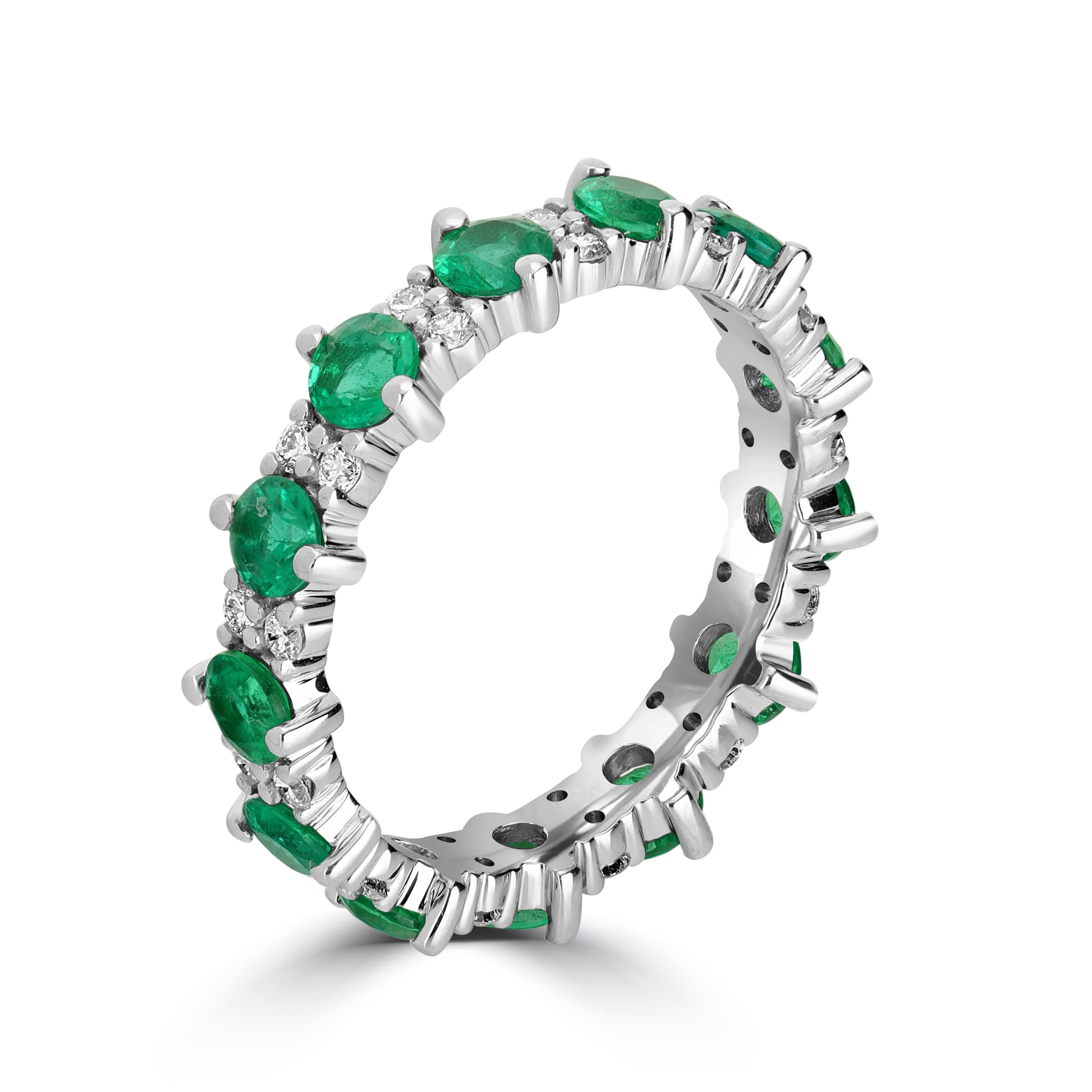 This everyday wear eternity band ring consists of emerald and diamonds of total 1.84 carats. What makes this ring so special? The reason are the stones used, The emeralds and diamonds used are non commercial quality meaning they are of a rare
