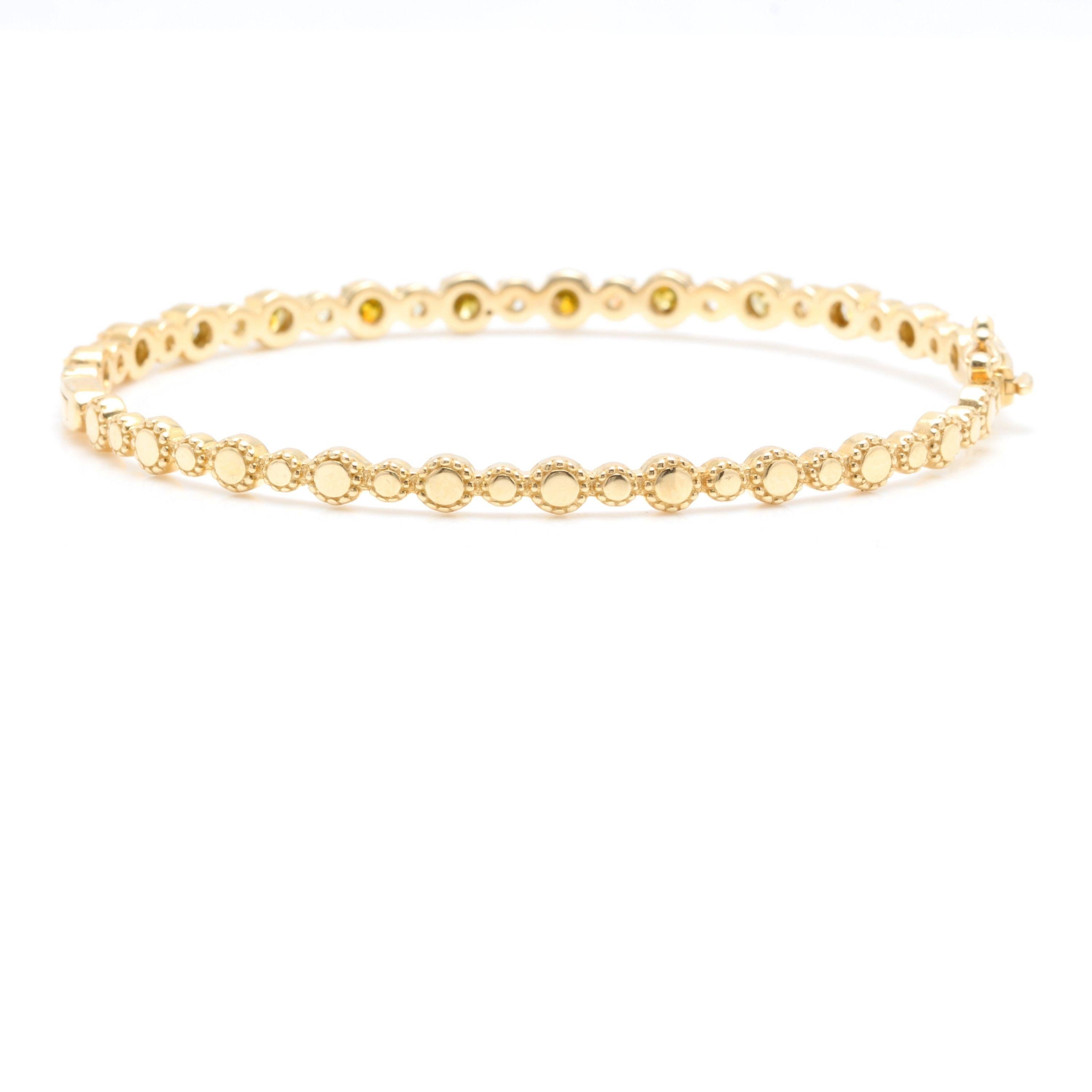 Very Impressive 1.84 Carats Natural Fancy Color Diamond 14K Solid Yellow Gold Bangle Bracelet

STAMPED: 14K

Total Natural Fancy Yellow Round Diamonds Weight: Approx. 1.84 Carats ( Color Enhanced / Clarity SI1-SI2)

Bangle Wrist Size is: 7