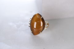 18.40 Carat Tiger Eye and 0.15 Carat Diamond 14 Karat Yellow Gold Cocktail Ring
