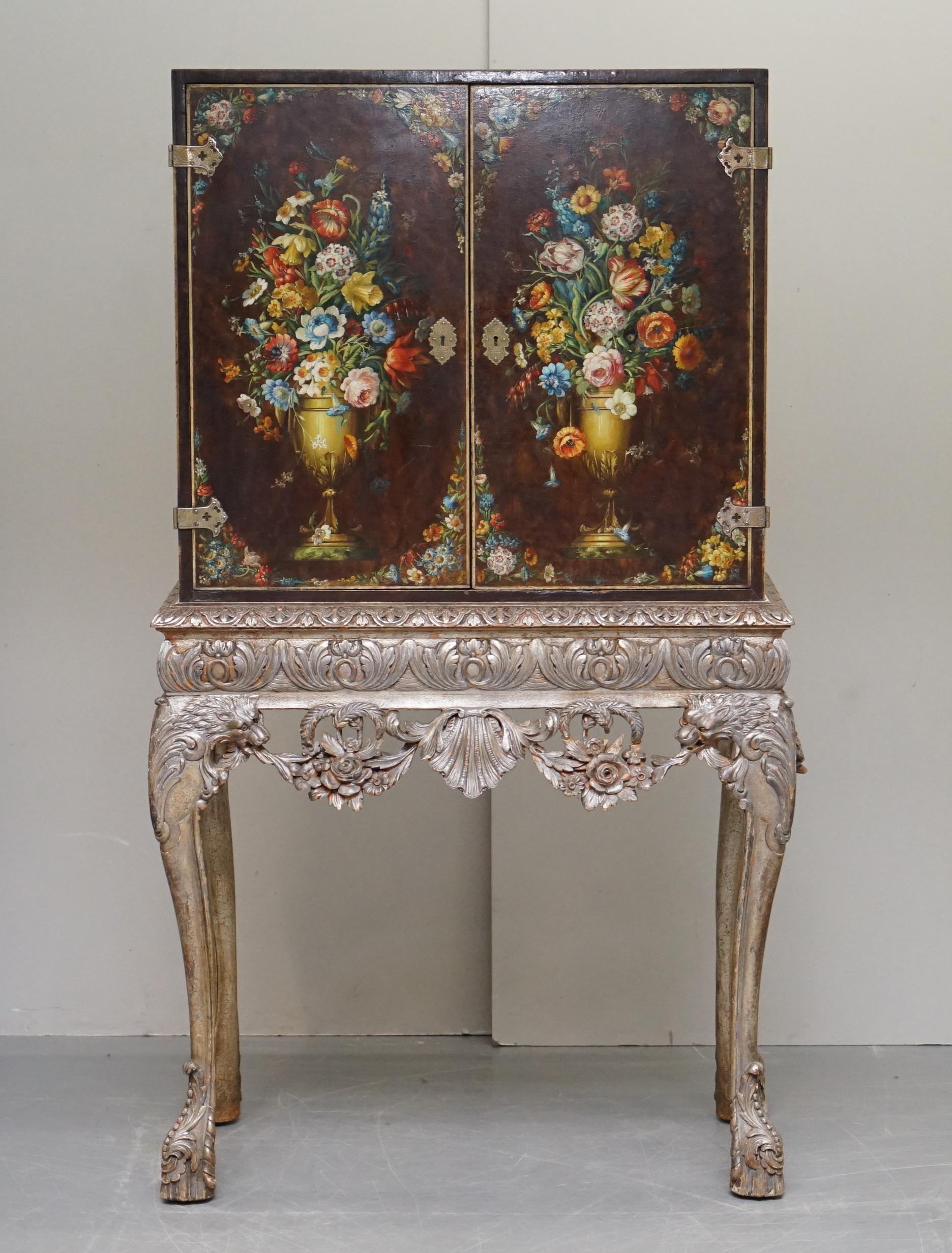 We are delighted to offer for sale this sublime circa 1840 Italian Venetian Polychrome painted cabinet on stand with Lion head carved silver leaf painted base

An exquisite looking and very well made piece, the base is ornately carved from top to