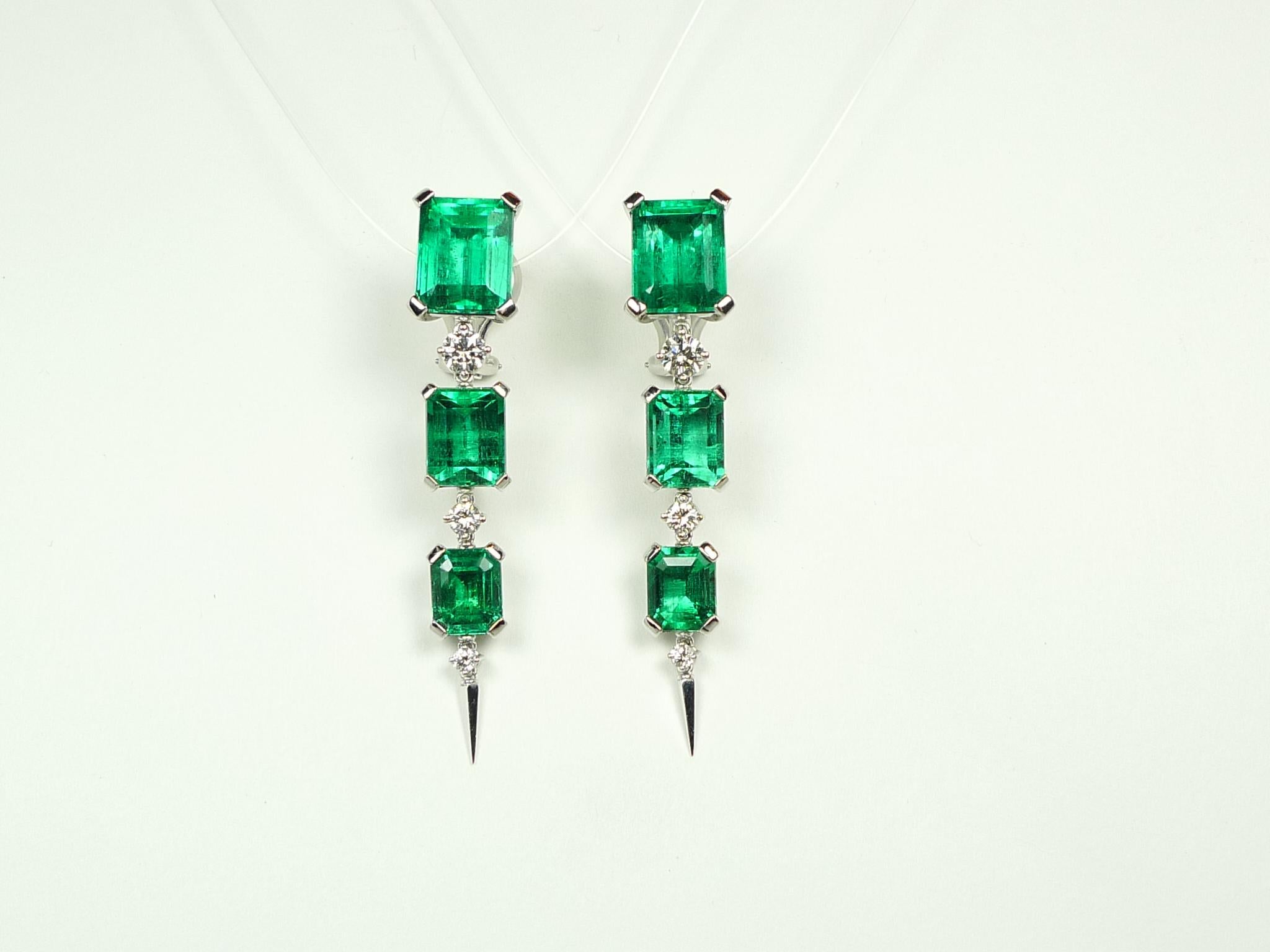 Outstanding Colombian emerald and diamond earrings, handcrafted in solid 18 karat white gold. Showcasing a super rare set of six high quality natural Colombian emeralds, equal in color and shining, coming from the same crystal, with no treatment,