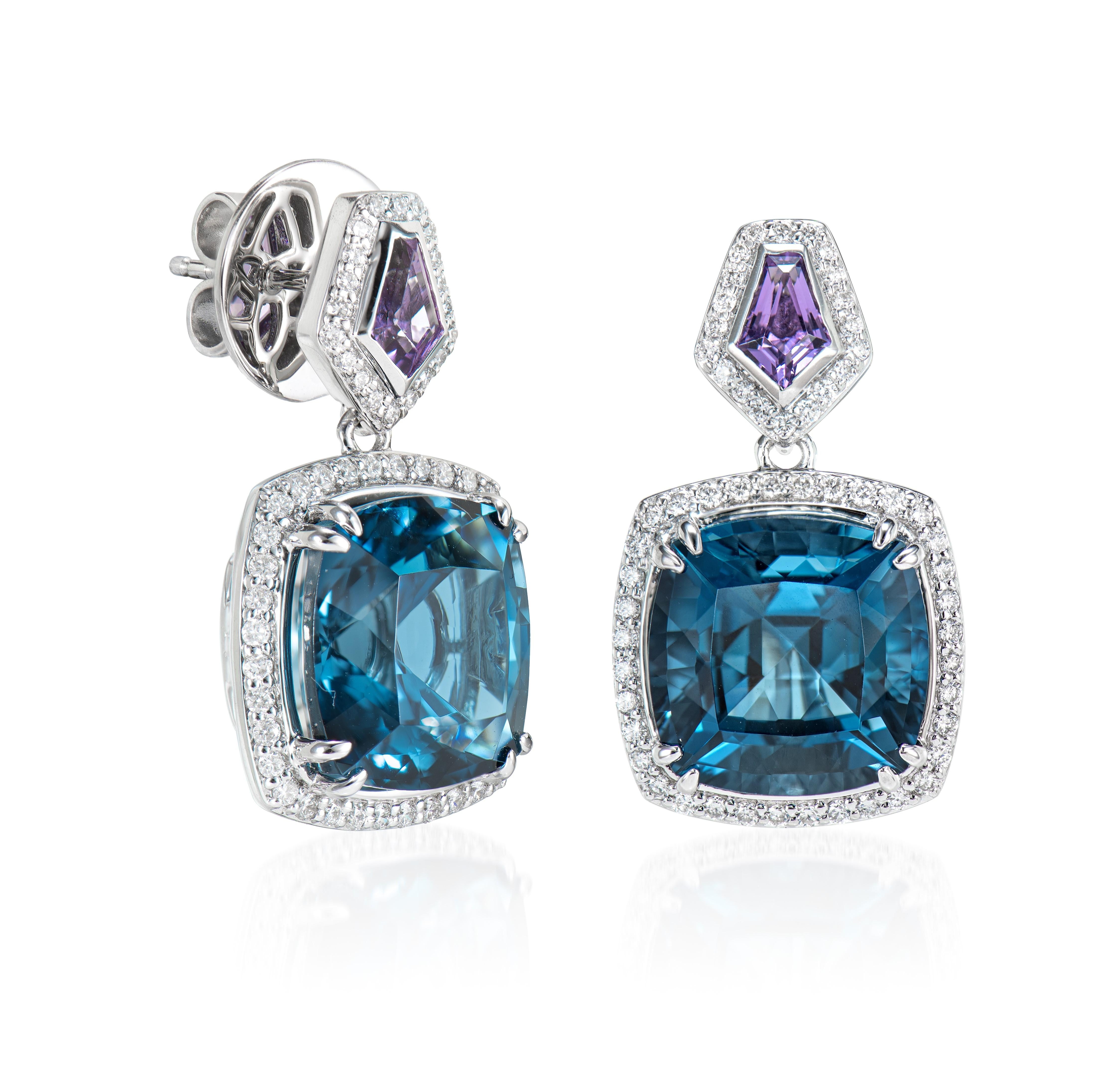 Bold Blue Topaz! Light and easy to wear these earrings showcase deep blue topaz accented with a multi color gemstone and diamond frame. These earrings are dainty yet have a great pop of color from the vibrant gems.

London Blue Topaz Drop Earrings