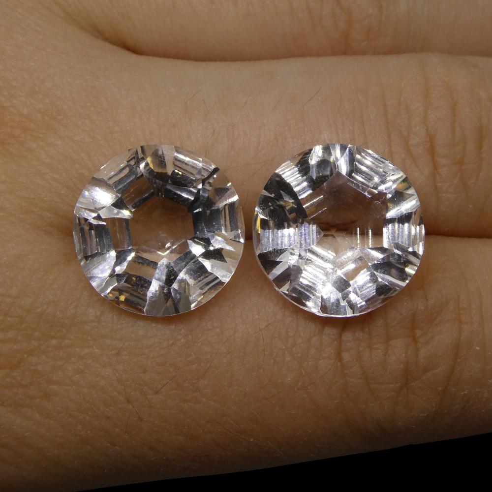 Description:

Gem Type: White Quartz
Number of Stones: 2
Weight: 18.44 cts
Measurements: 14x14x8.50 mm
Shape: Round
Cutting Style: Fantasy Cut
Cutting Style Crown: Modified Brilliant
Cutting Style Pavilion: Mixed Cut
Transparency: