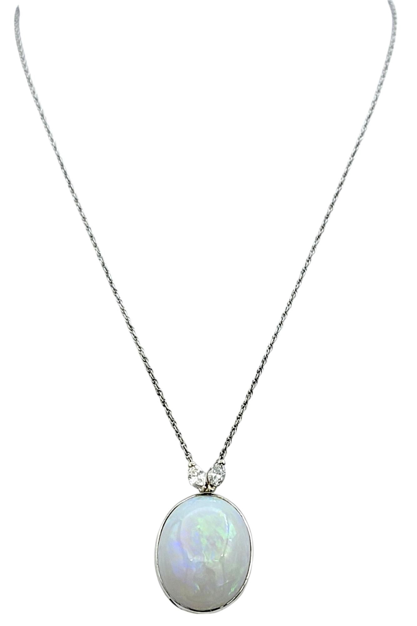 Oval Cut 18.46 Carat Opal Pendant Necklace with Marquise Diamonds in 14 Karat White Gold For Sale