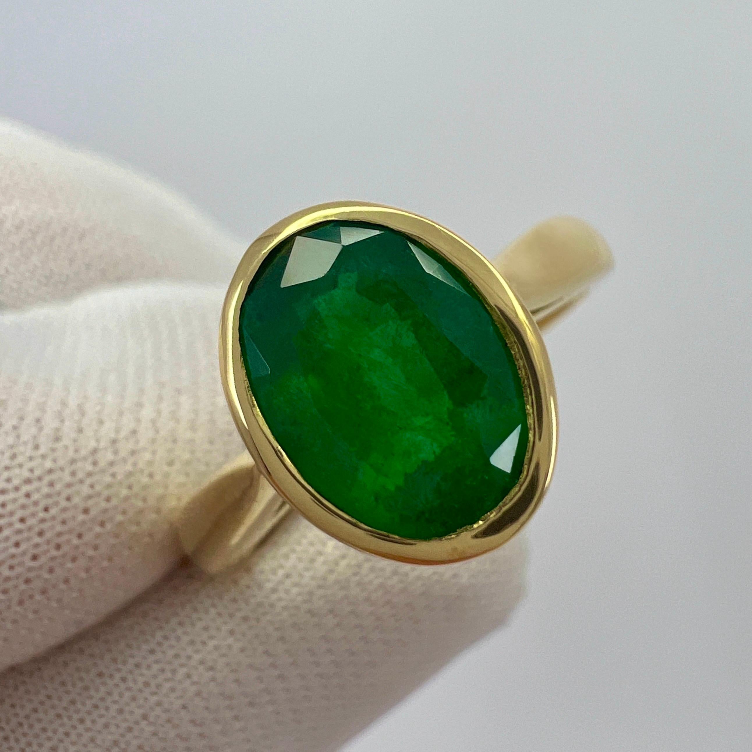1.84ct Deep Green Emerald Oval Cut 18k Yellow Gold Rubover Bezel Solitaire Ring In New Condition In Birmingham, GB