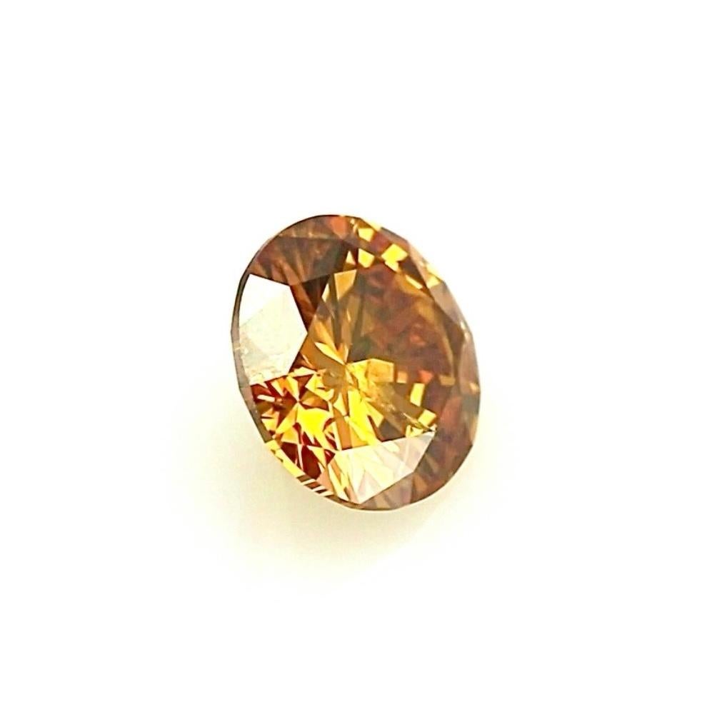 Außergewöhnlicher 1,84 Karat runder Brillantdiamant in tiefem Gelb-Orange - GIA zertifiziert

Dieser seltene und faszinierende 1,84-Karat-Diamant mit rundem Brillantschliff hat eine auffallende Fancy Deep Yellow-Orange-Farbe, einen einzigartigen