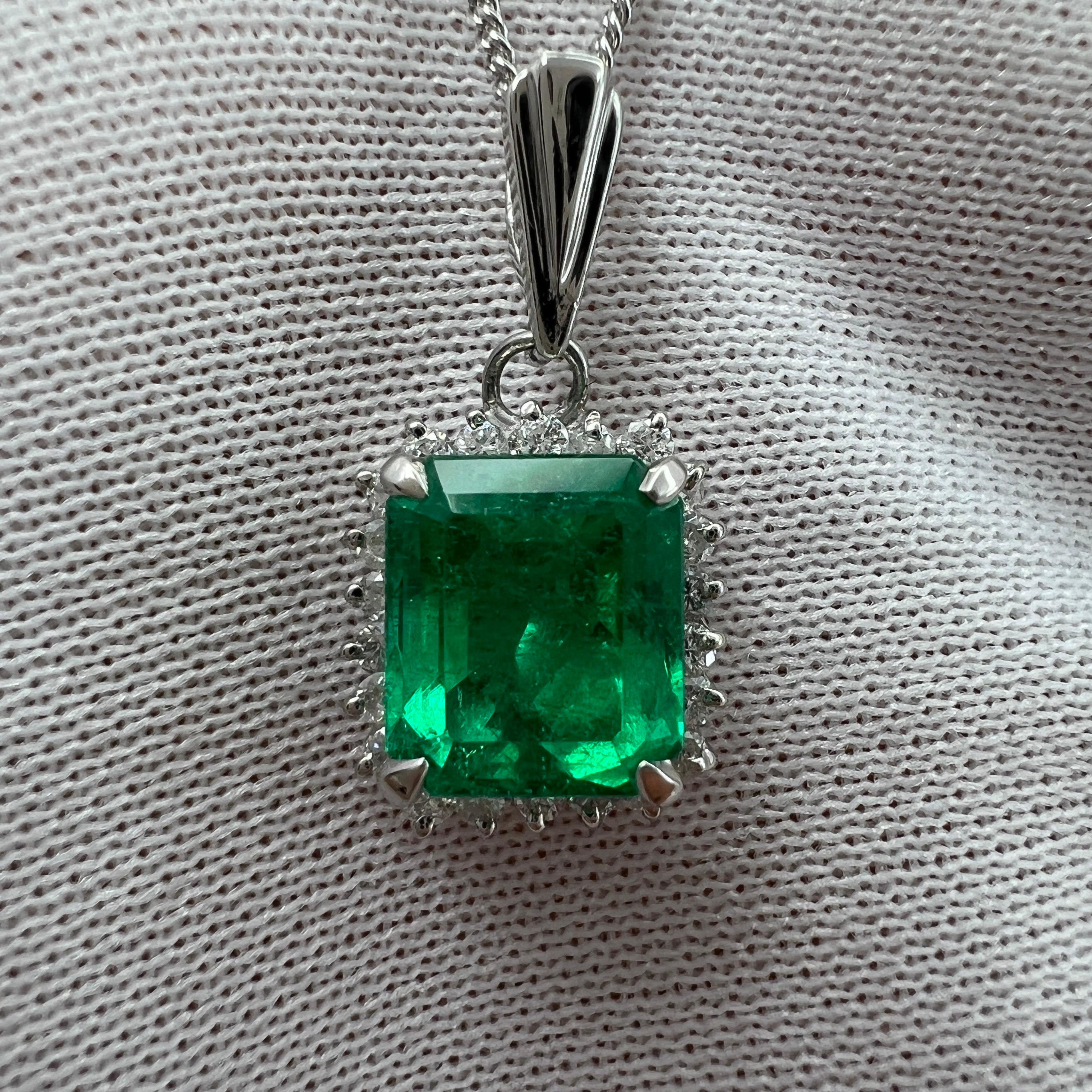 Natural Vivid Green Colombian Emerald & Diamond Platinum Halo Pendant Necklace.

1.61 Carat Colombian emerald with a fine, vivid green colour and very good clarity. Some small natural inclusions visible when looking closely (as expected with