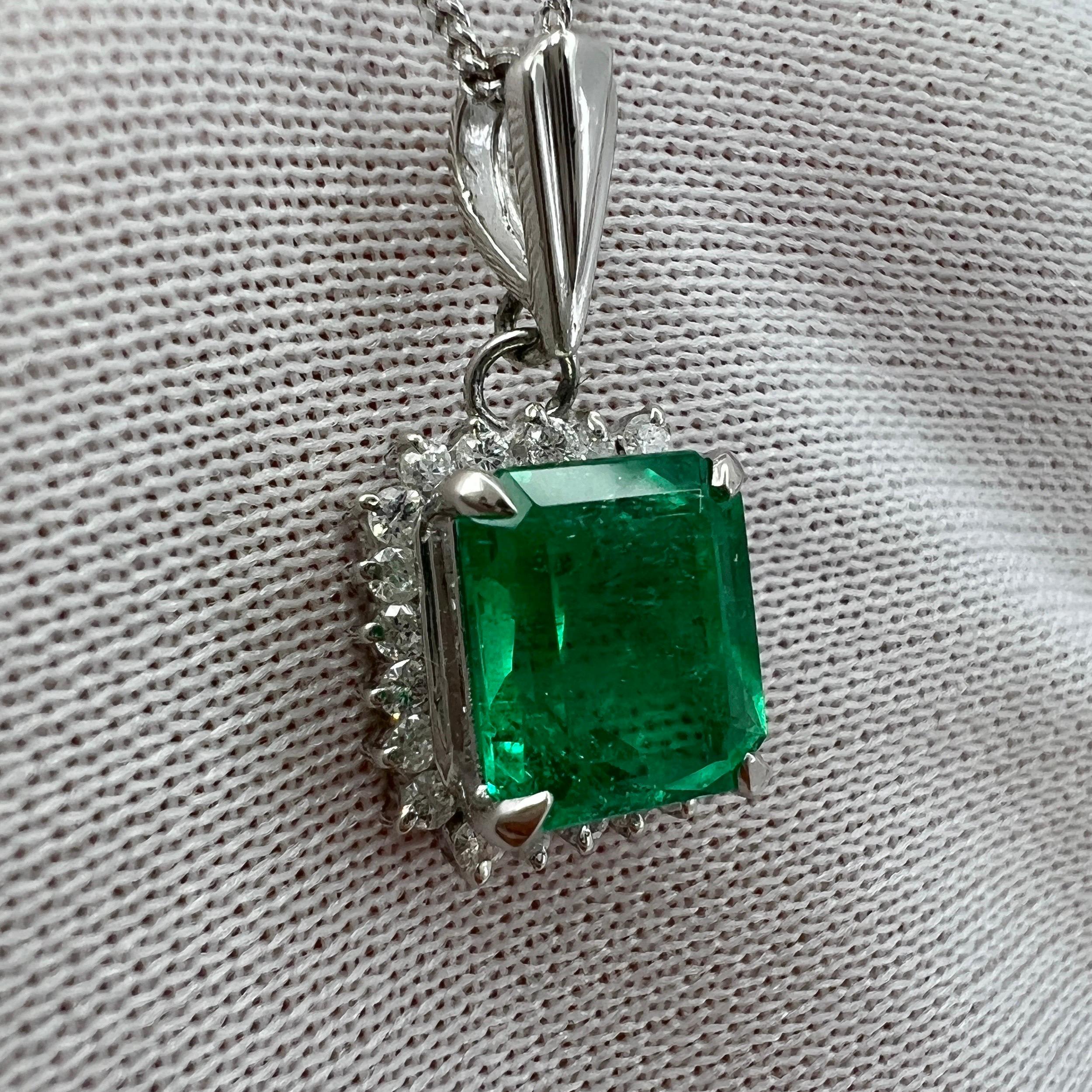 Emerald Cut 1.84ct Vivid Green Colombian Emerald and Diamond Platinum Halo Pendant Necklace