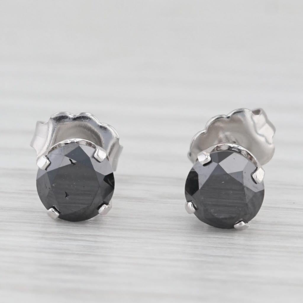 Gemstone Information:
- Natural Diamonds -
Total Carats - 1.84ctw
Cut - Round Brilliant
Color - Treated Black
Please note there are surface reaching inclusions.

Metal: 14k White Gold
Weight: 1.3 Grams 
Stamps: 14k
Closure: Stick Posts & Butterfly